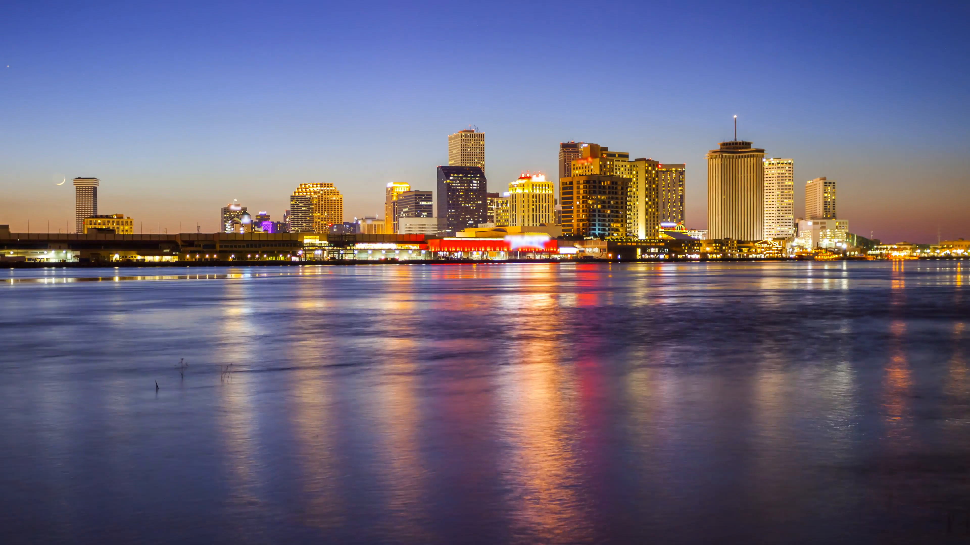Skyline of New Orleans Across the Mississippi River - Day to Night ...