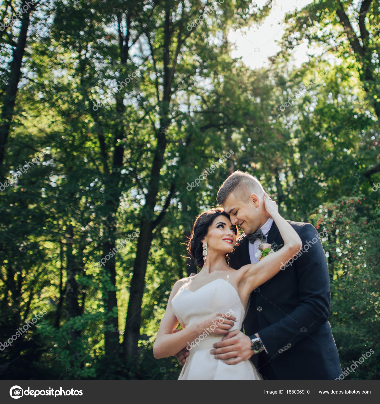 Newly Wedded Couple Hugging Trees Park — Stock Photo © LadanivskyyO ...