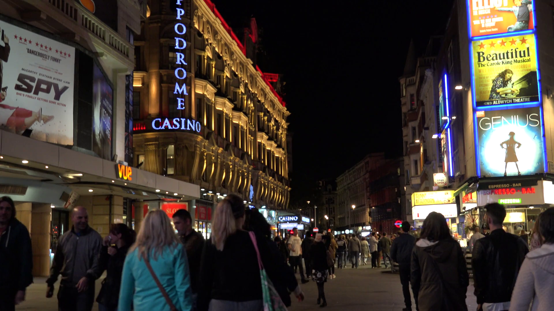 4K Tourist people visit commercial area in London by night shopping ...