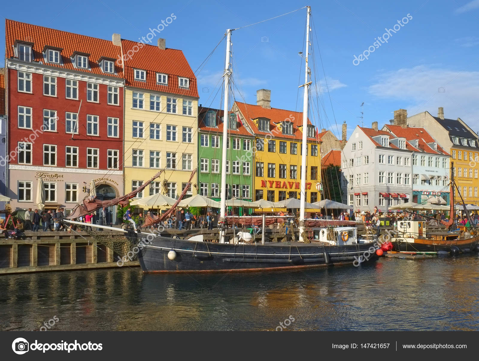 The Nyhavn waterfront in Copenhagen. – Stock Editorial Photo ...