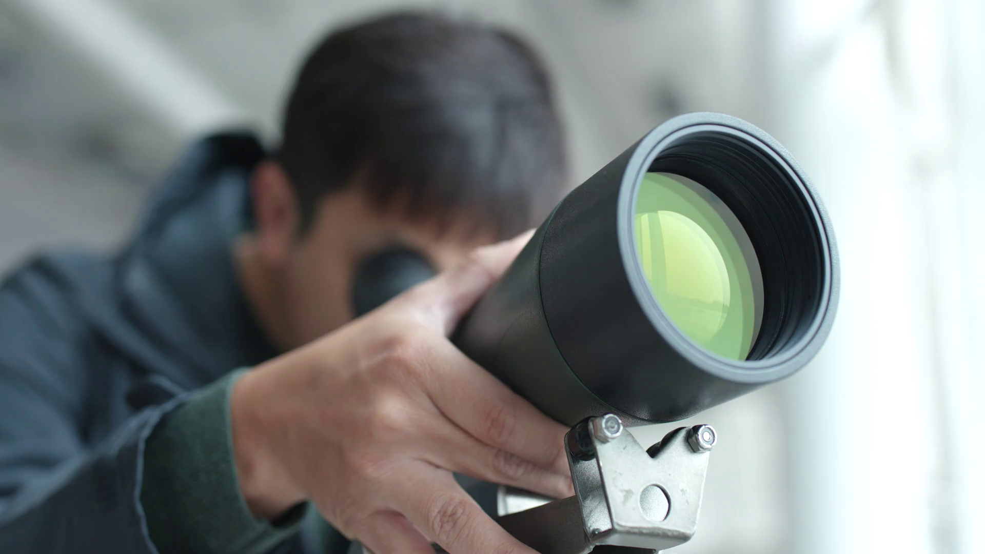 Man looking through telescope to observe the bird habitat Stock ...