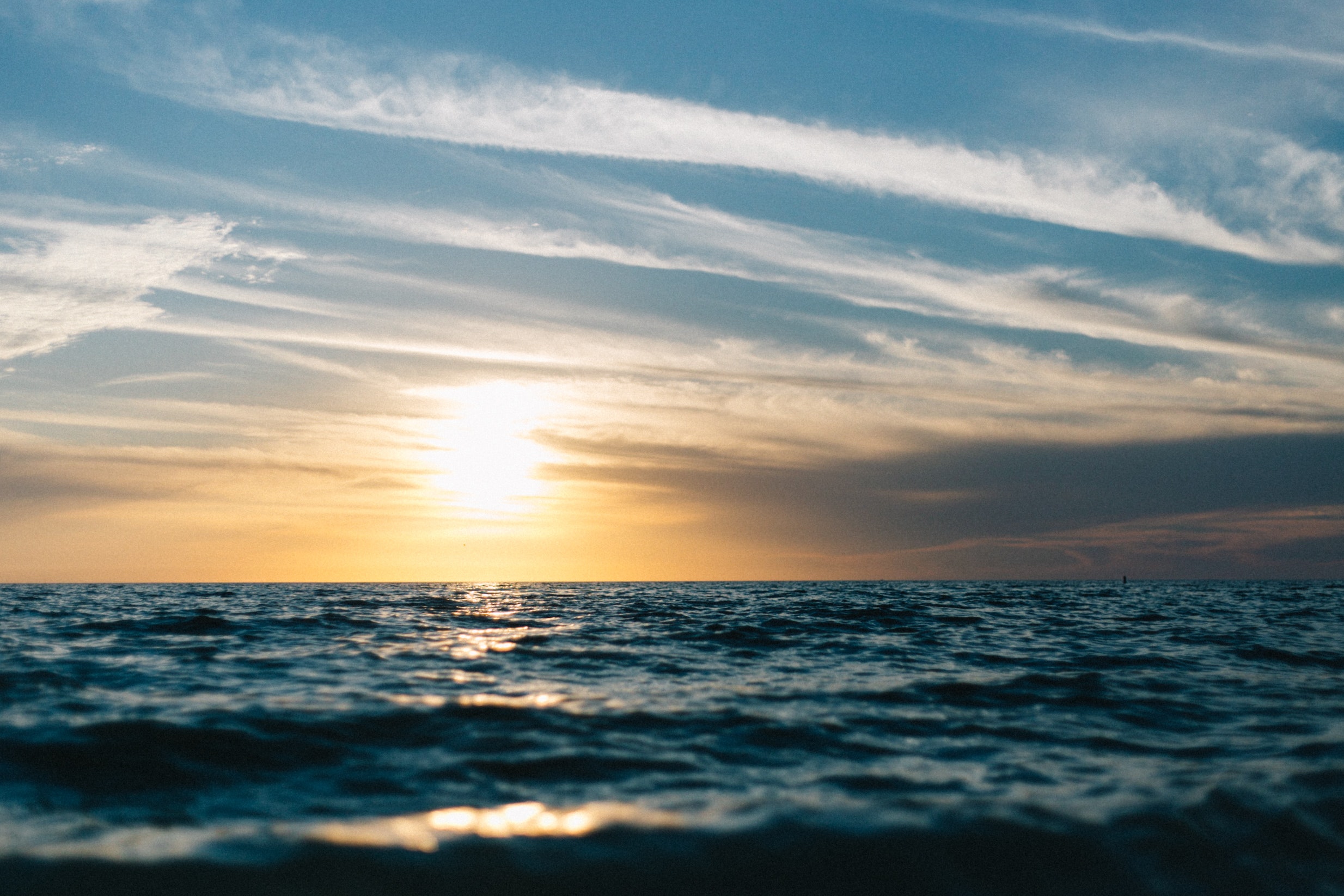 Ocean during sunset photo