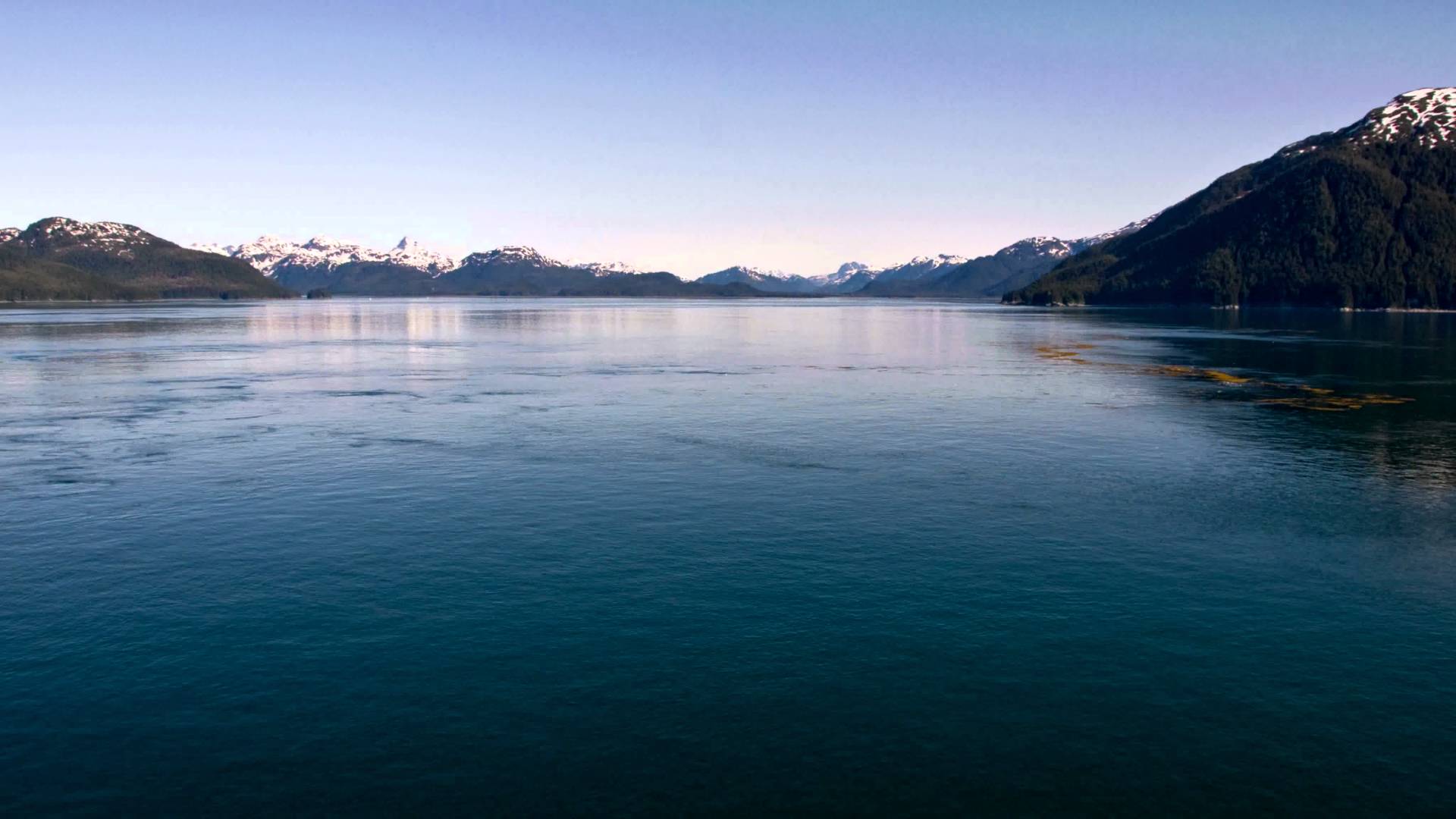Traveling time-lapse of mountains around the ocean near Glacier Bay ...