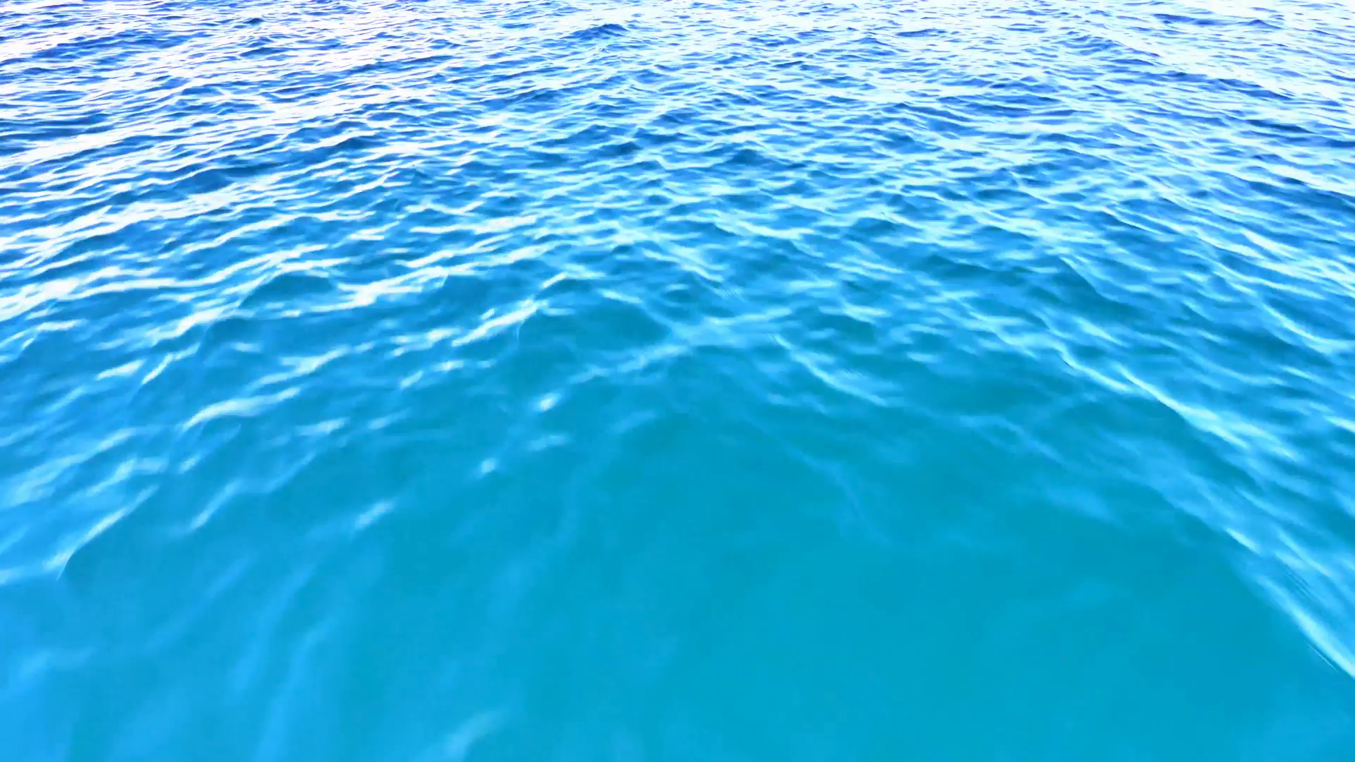 Flying fast above water. Blue sea ripples and waves loop seamless ...