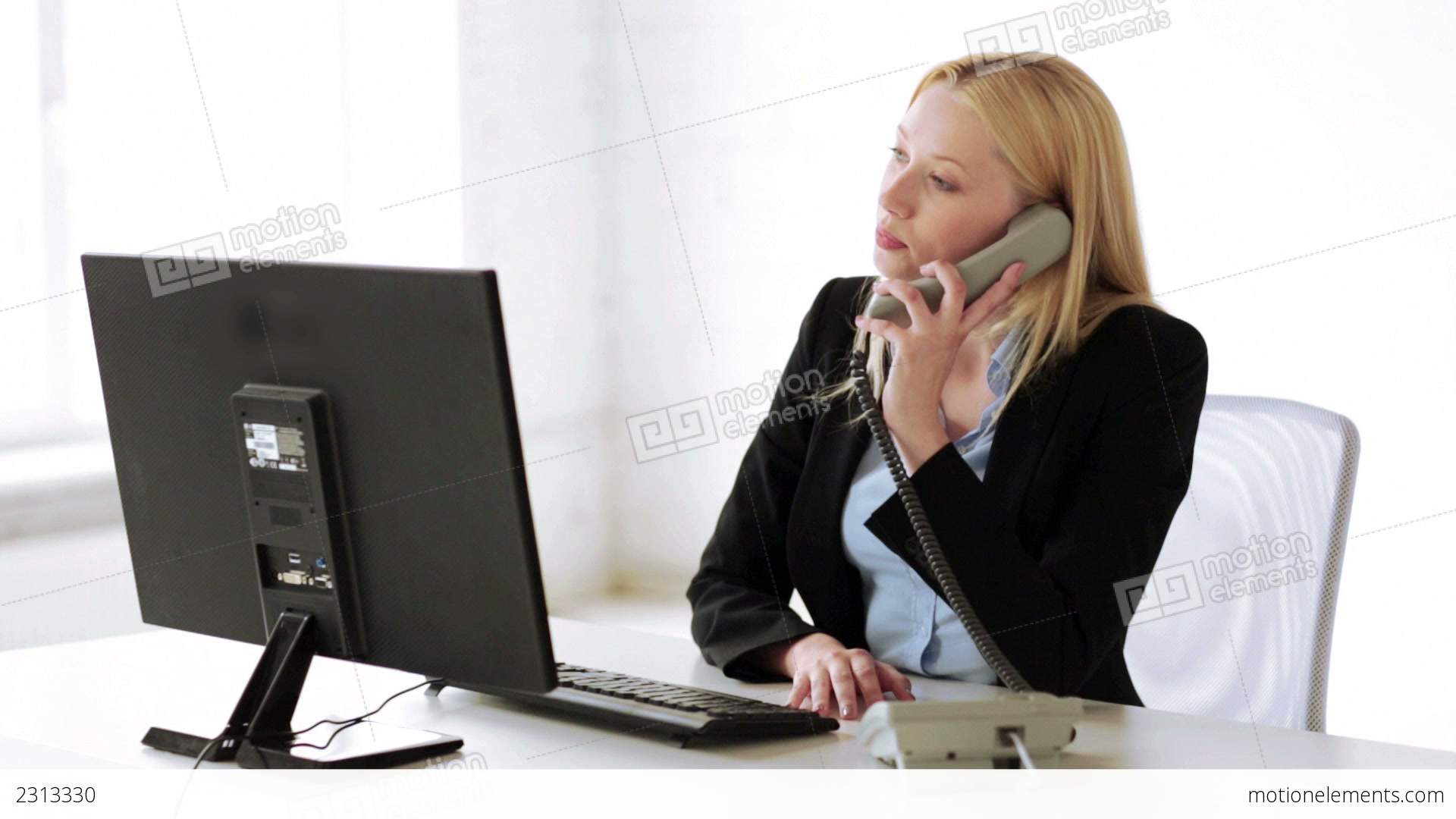 Attractive Office Worker Taking Phone Call Stock video footage | 2313330