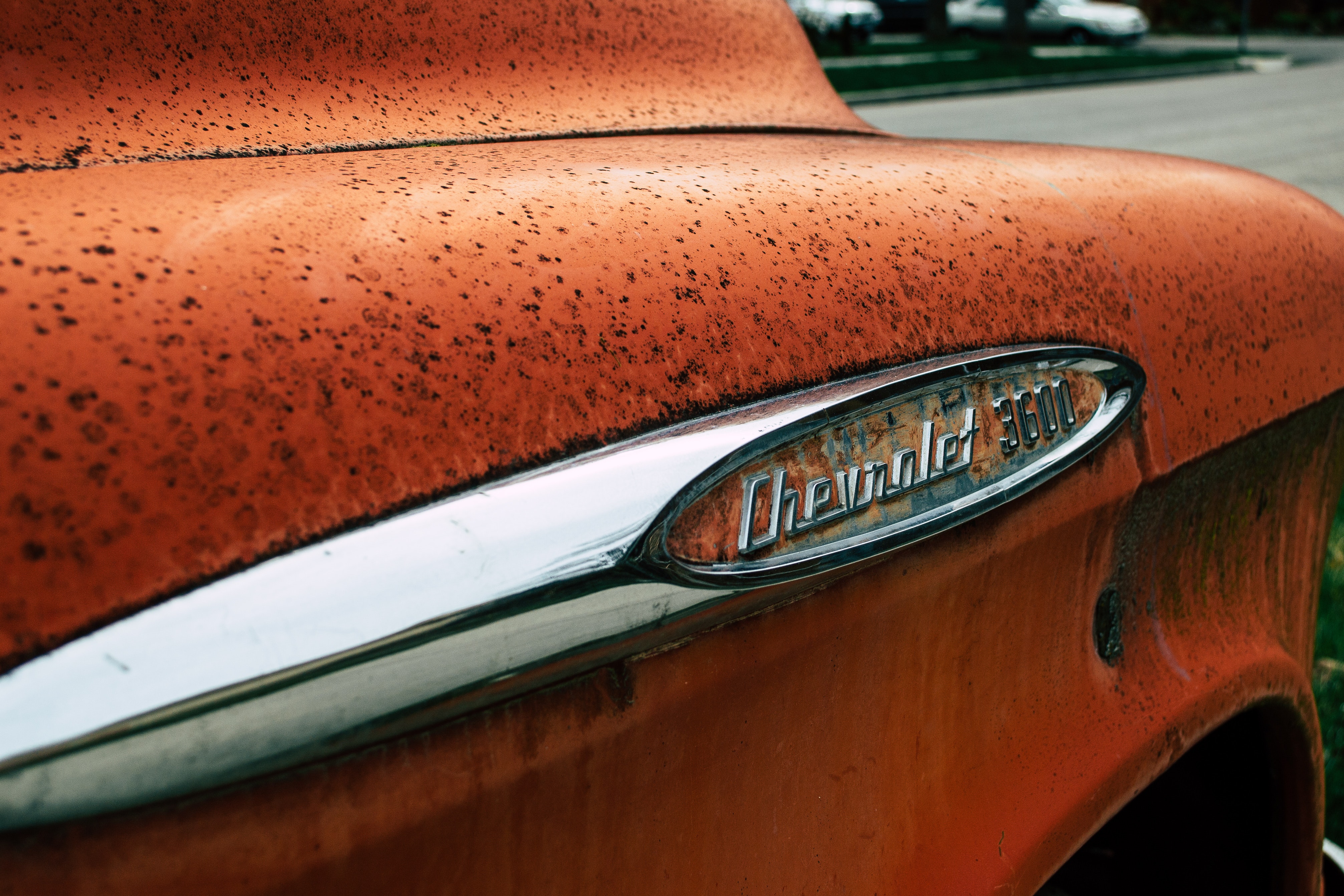 Old and rusty retro orange car photo