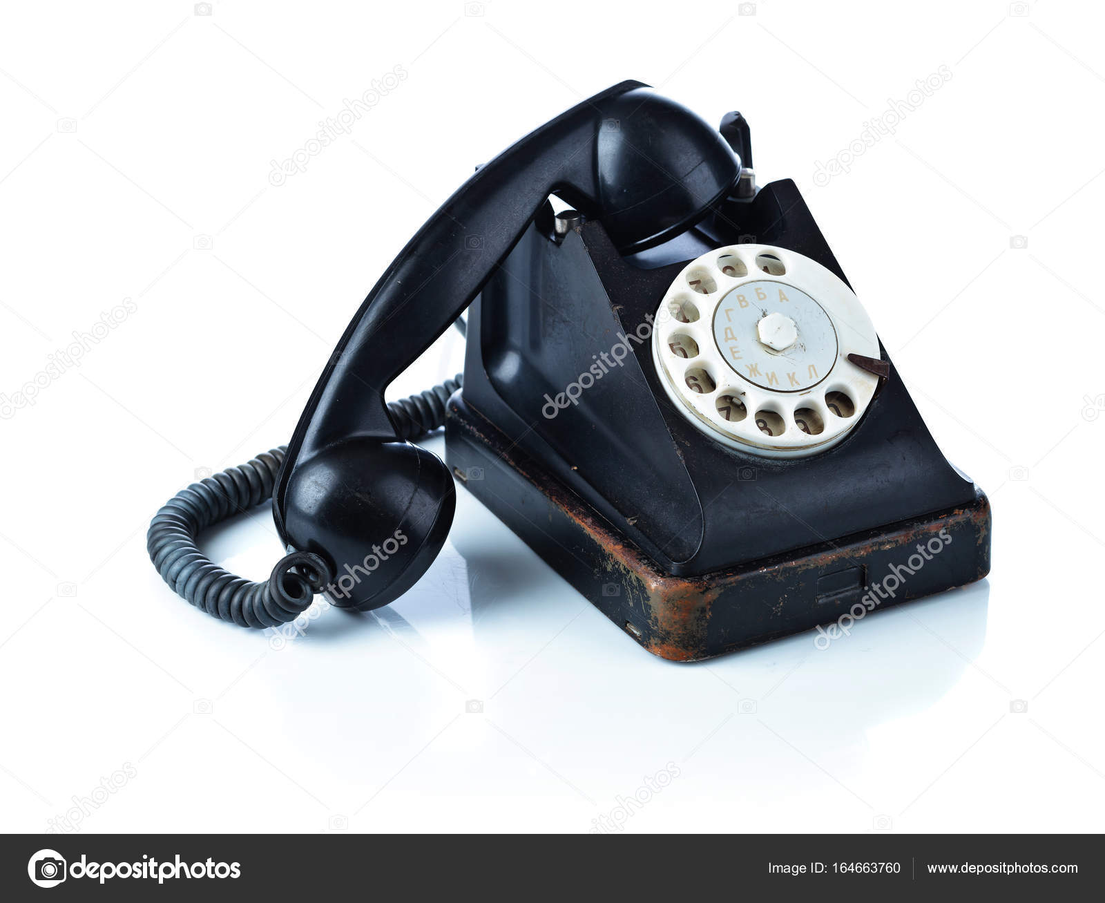 Old black phone isolated on white. — Stock Photo © igorr1 #164663760