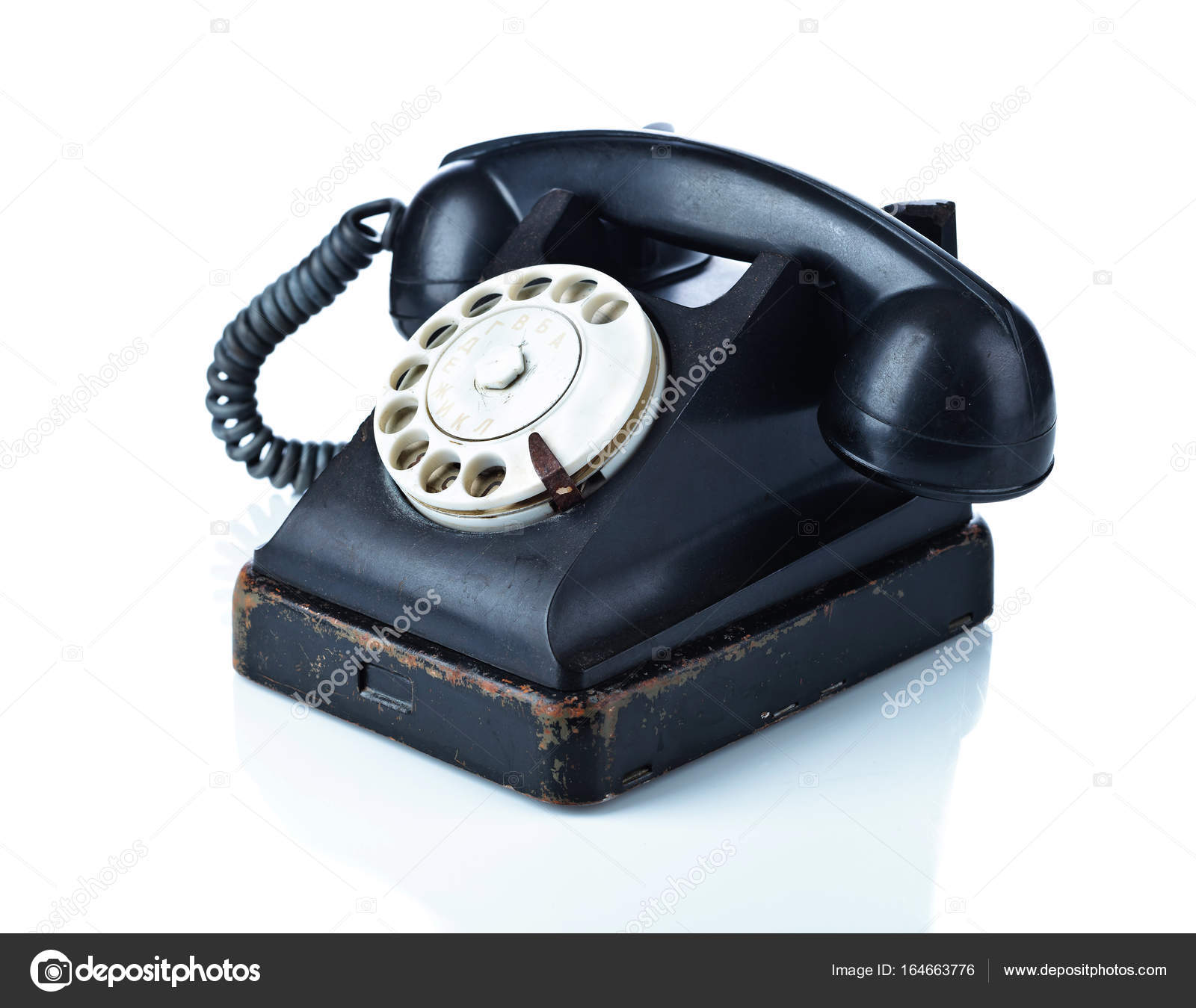 Old black phone isolated on white. — Stock Photo © igorr1 #164663776