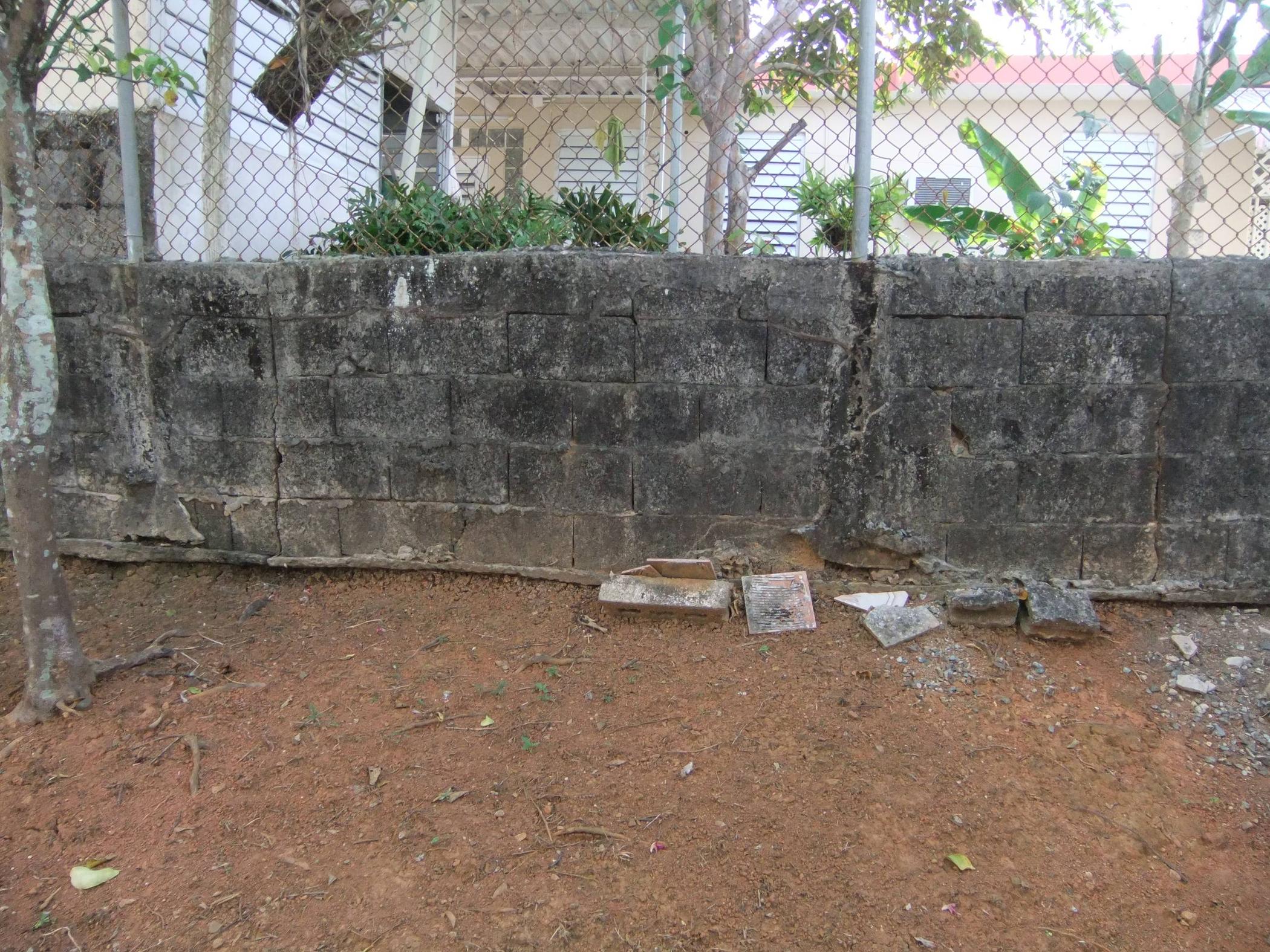How can I prevent this concrete block wall from falling over? - Home ...