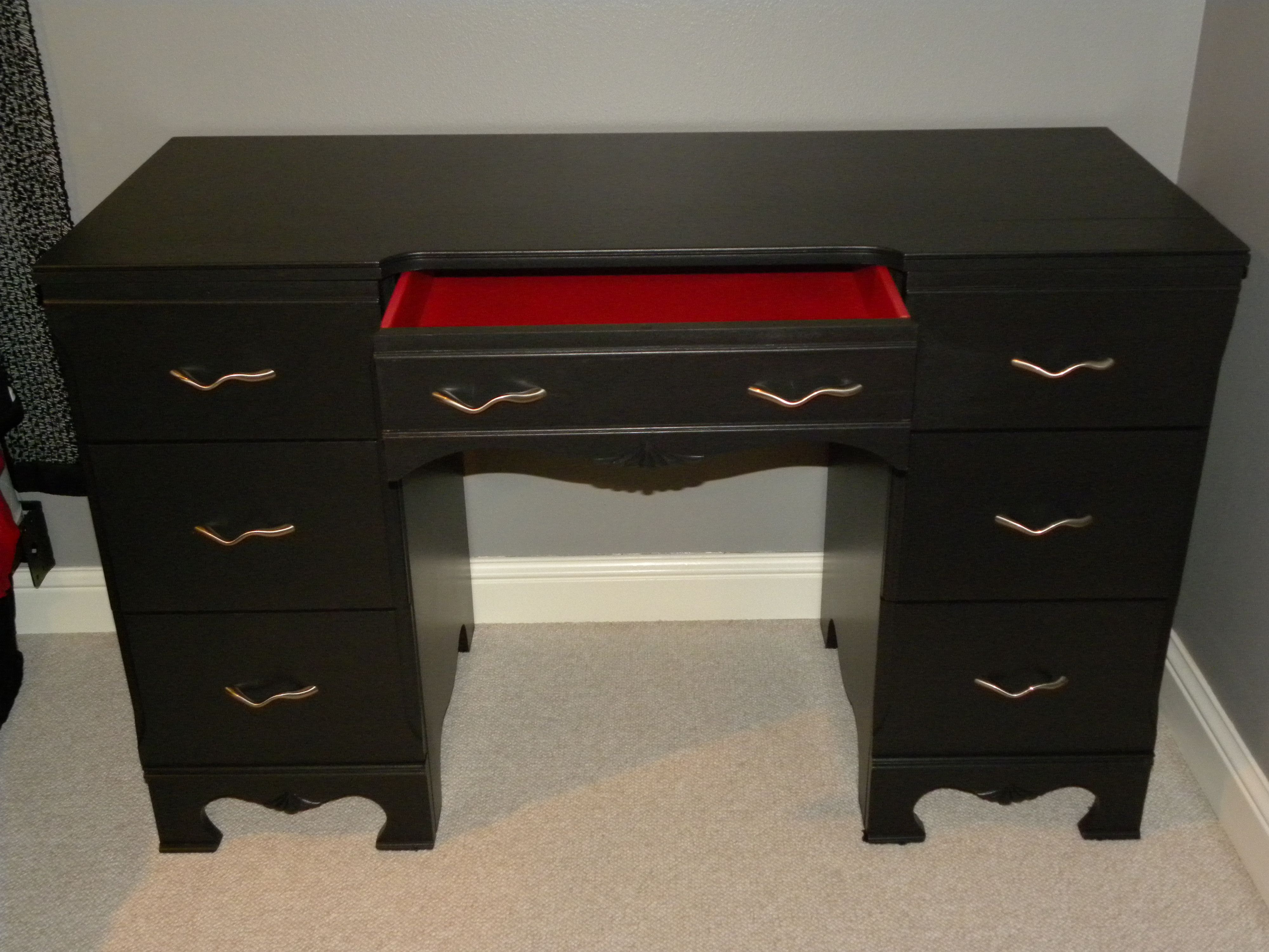 Painted old solid wood desk black. Painted inside drawers red and ...