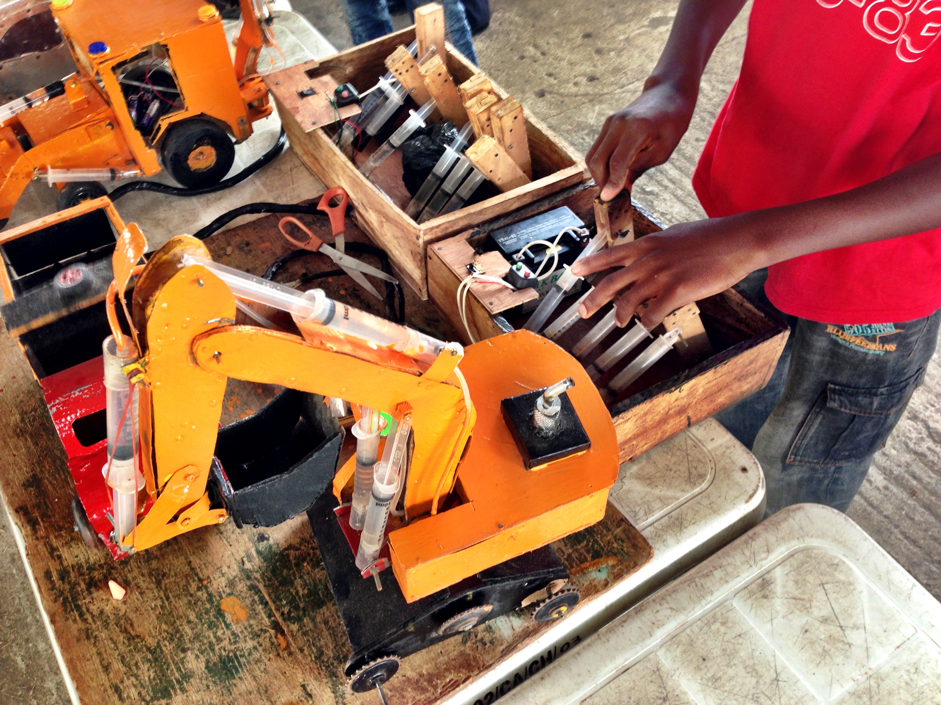 A 15 y/o Nigerian Boy's Hydraulic Toys : Maker Faire Africa