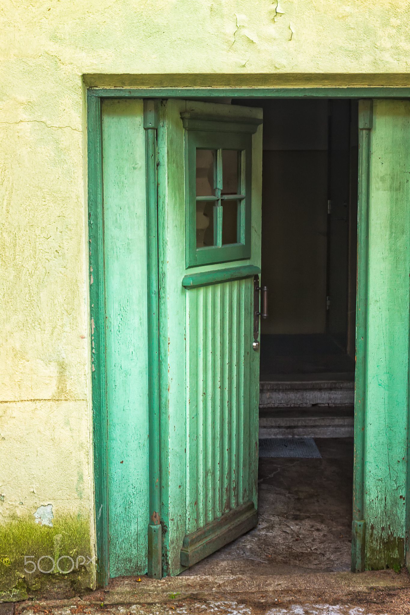 Green Door Open - An old door in an old stone building in Tallinn ...