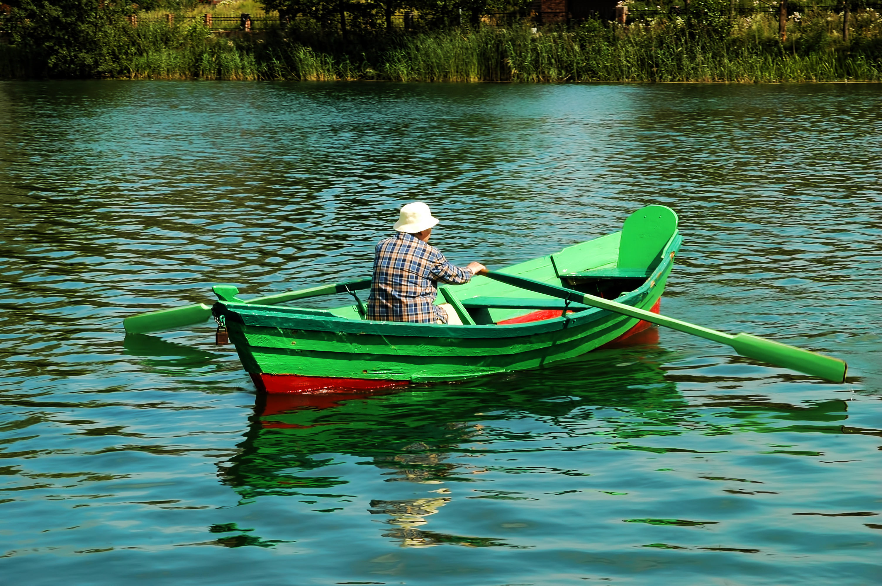 Old man in the boat photo