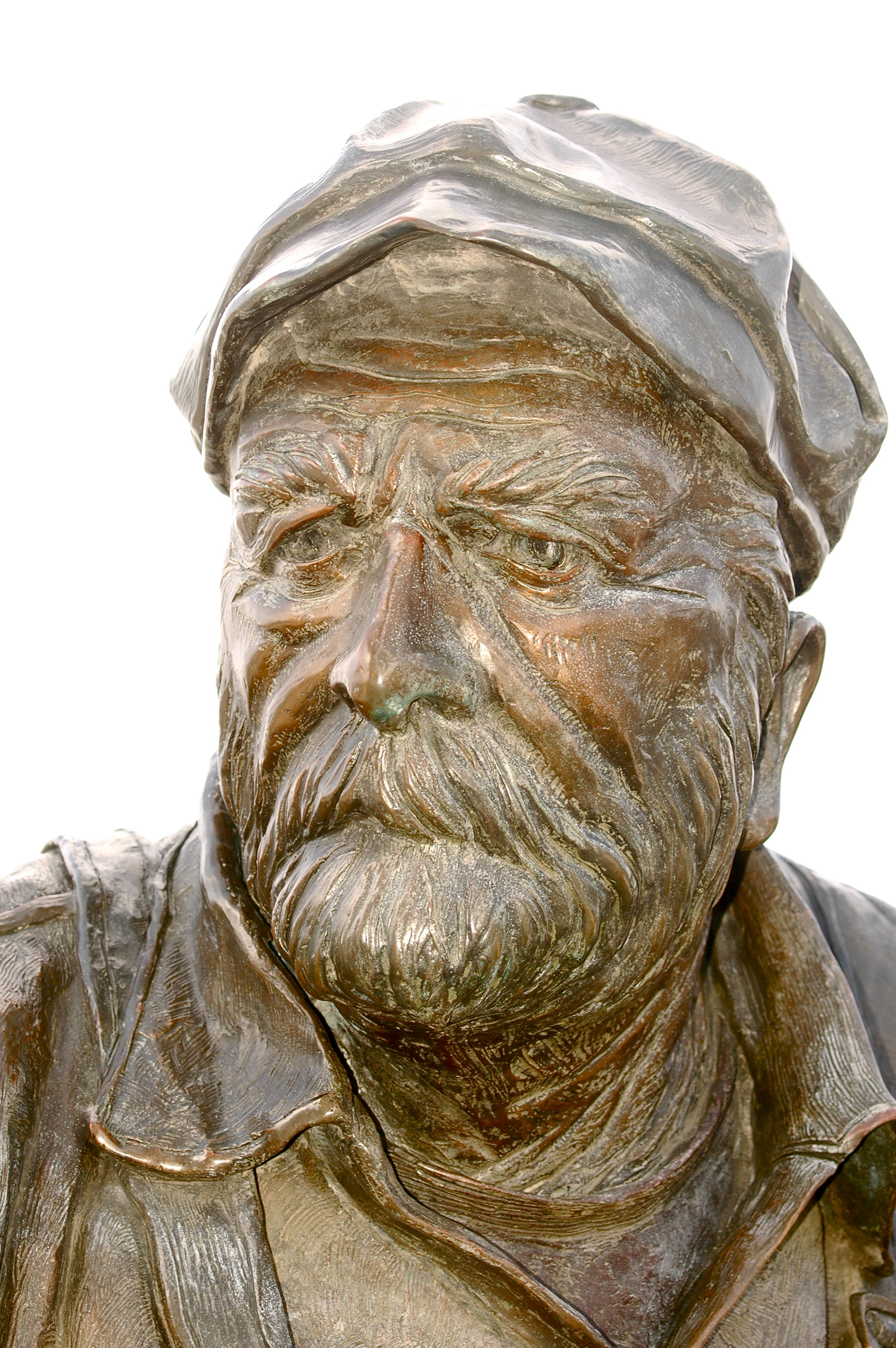 Old man sailor captain in bronze photo