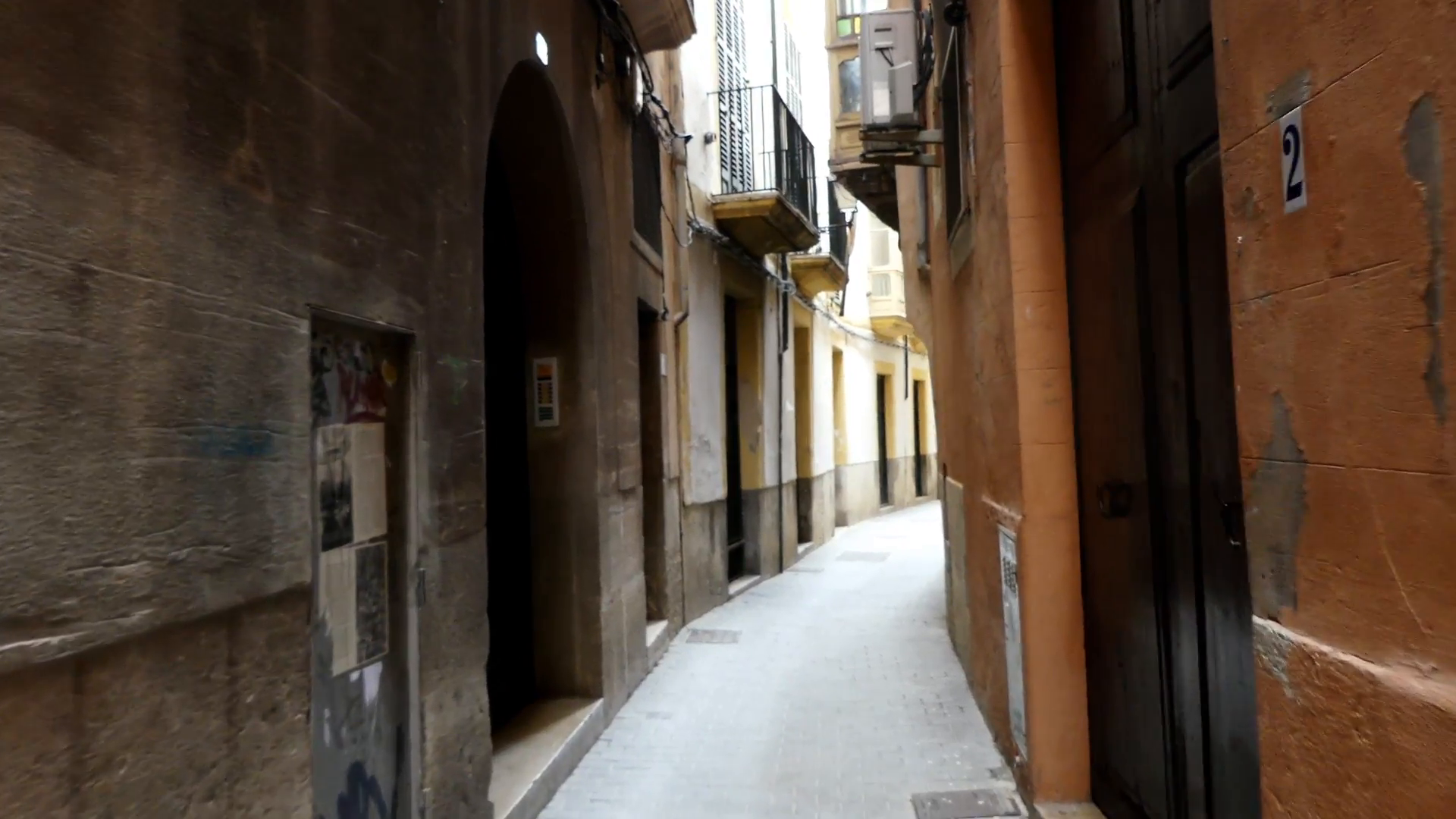 Old narrow street of Palma. Palma is the capital and largest city of ...