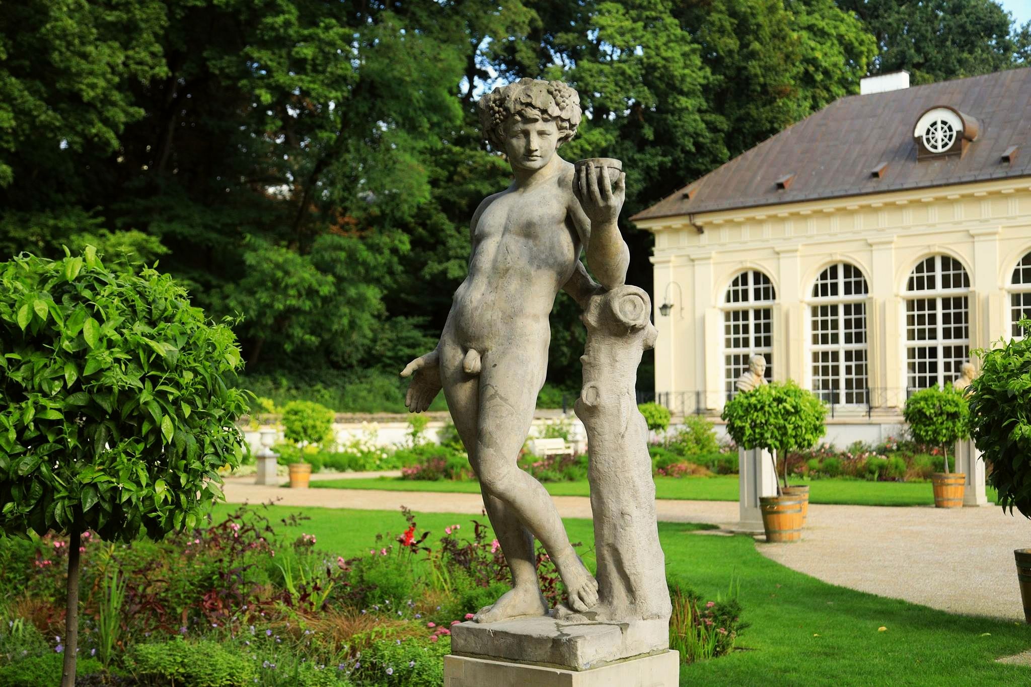 Garden statue of Bacchus before the Old Orangery in the Royal Baths ...