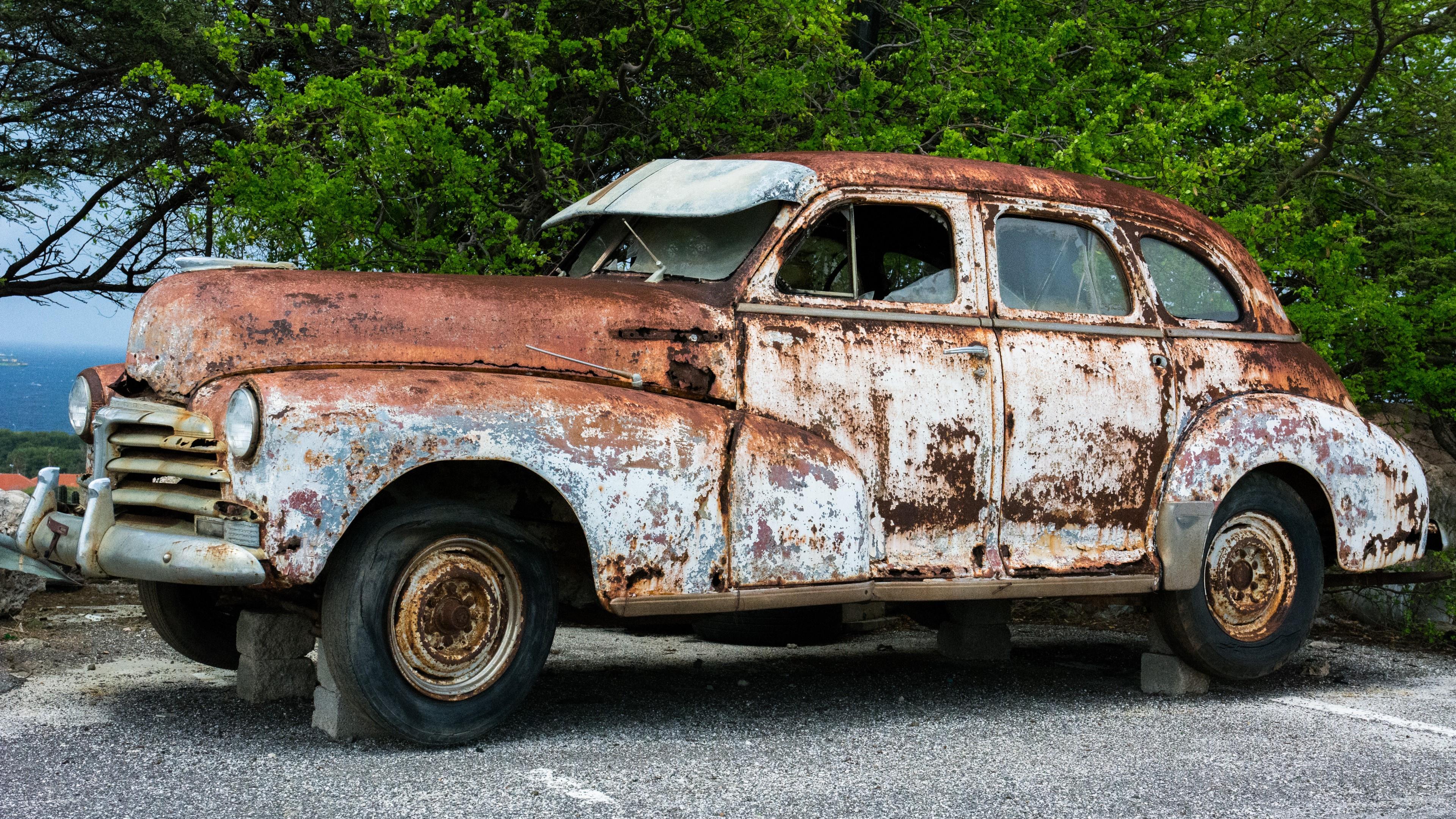 Broken Rusty Vintage Car On Bricks Wallpaper | Wallpaper Studio 10 ...