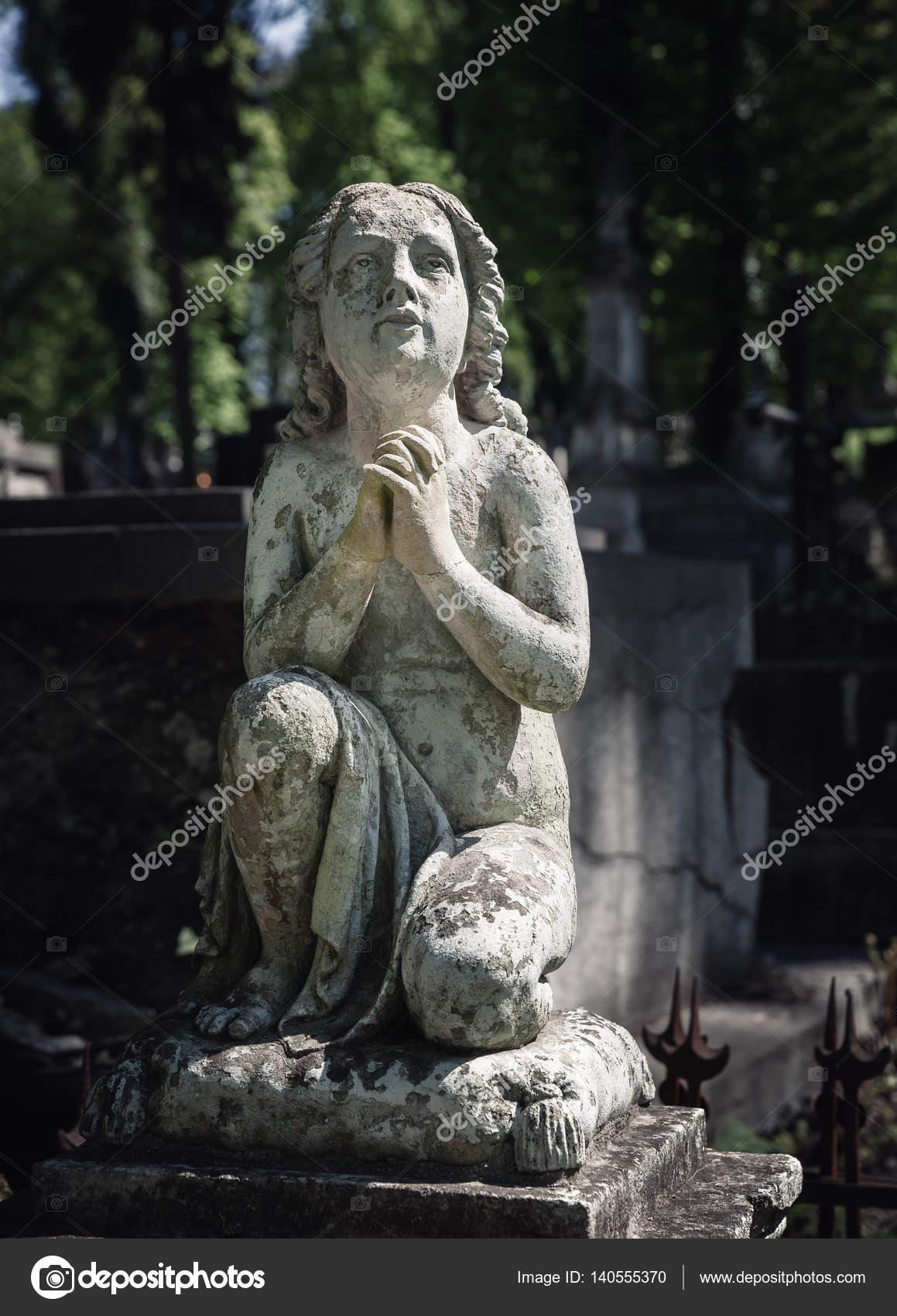 Old statue on grave in Lviv – Stock Editorial Photo © palinchak ...