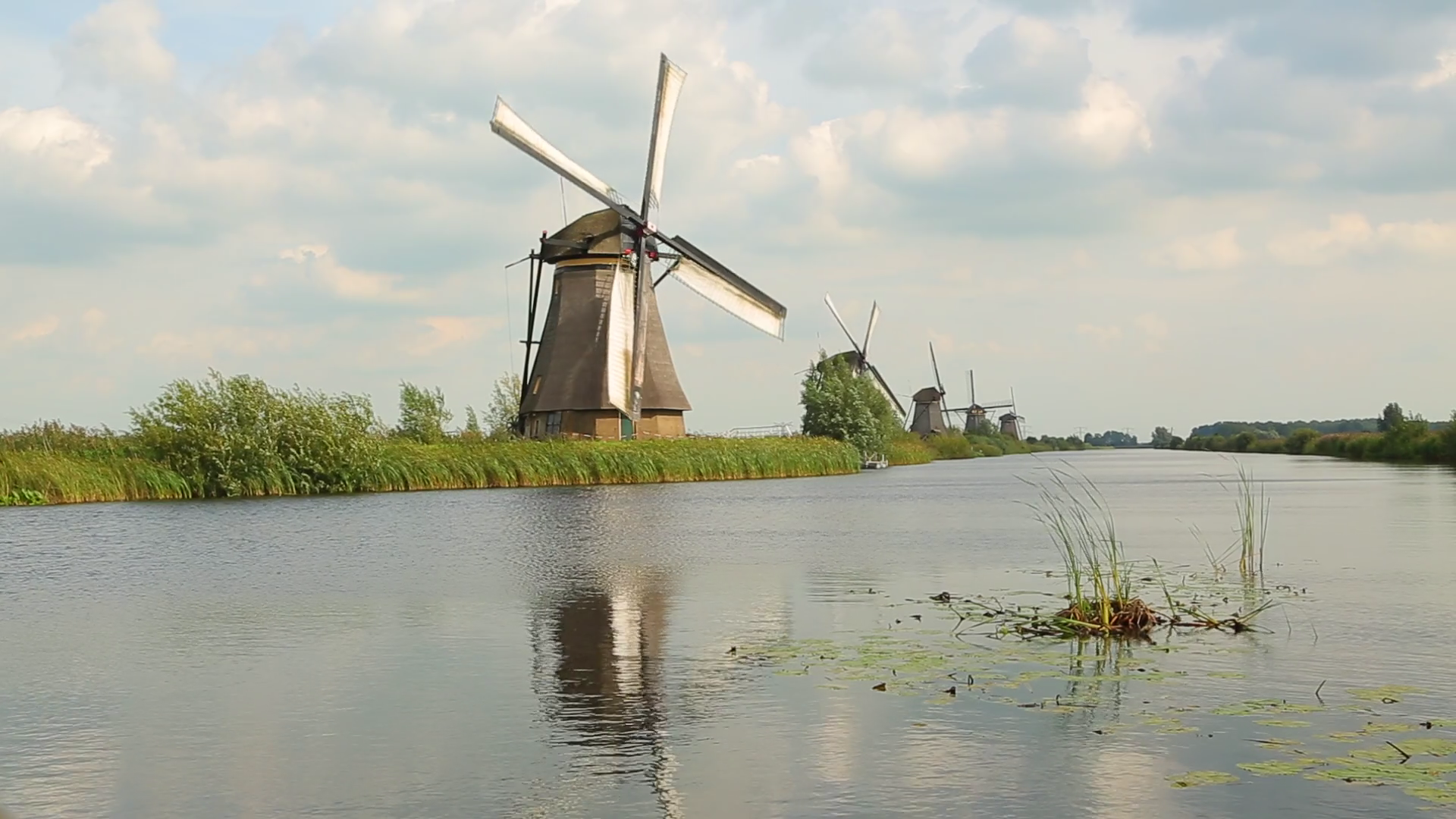Old windmill spinning in the wind Stock Video Footage - VideoBlocks