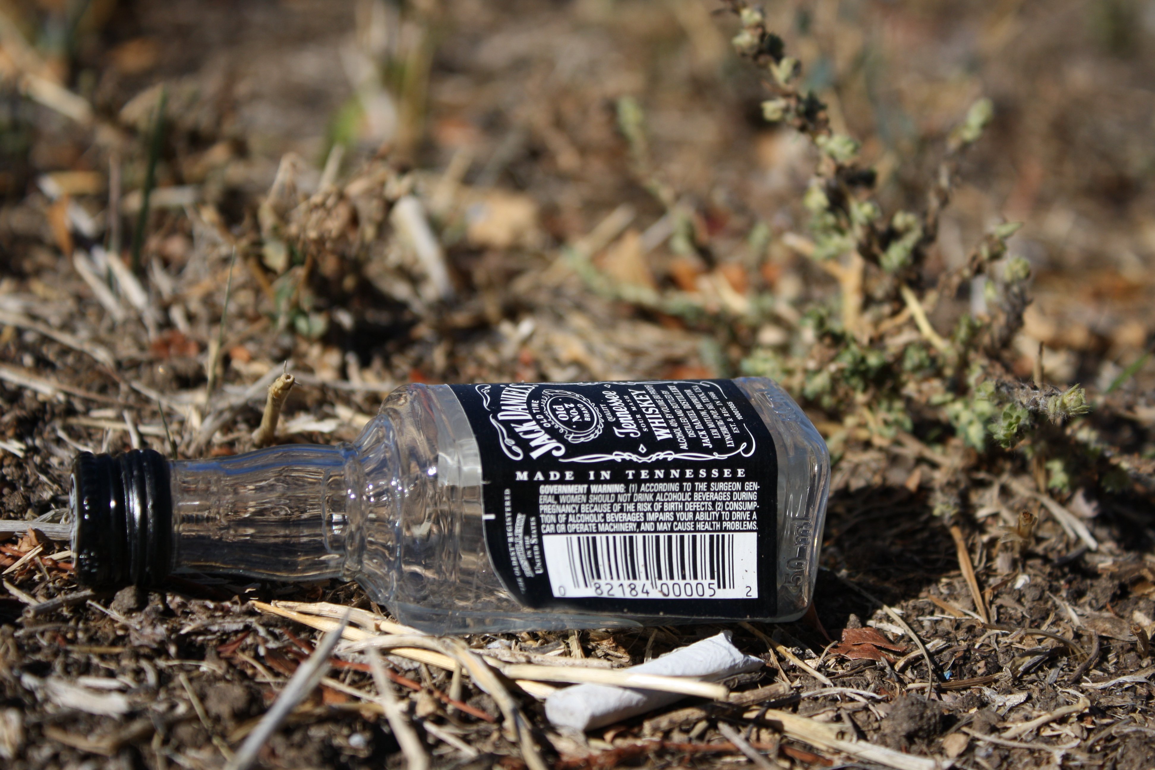 Jack Daniels Bottle on Ground Picture | Free Photograph | Photos ...