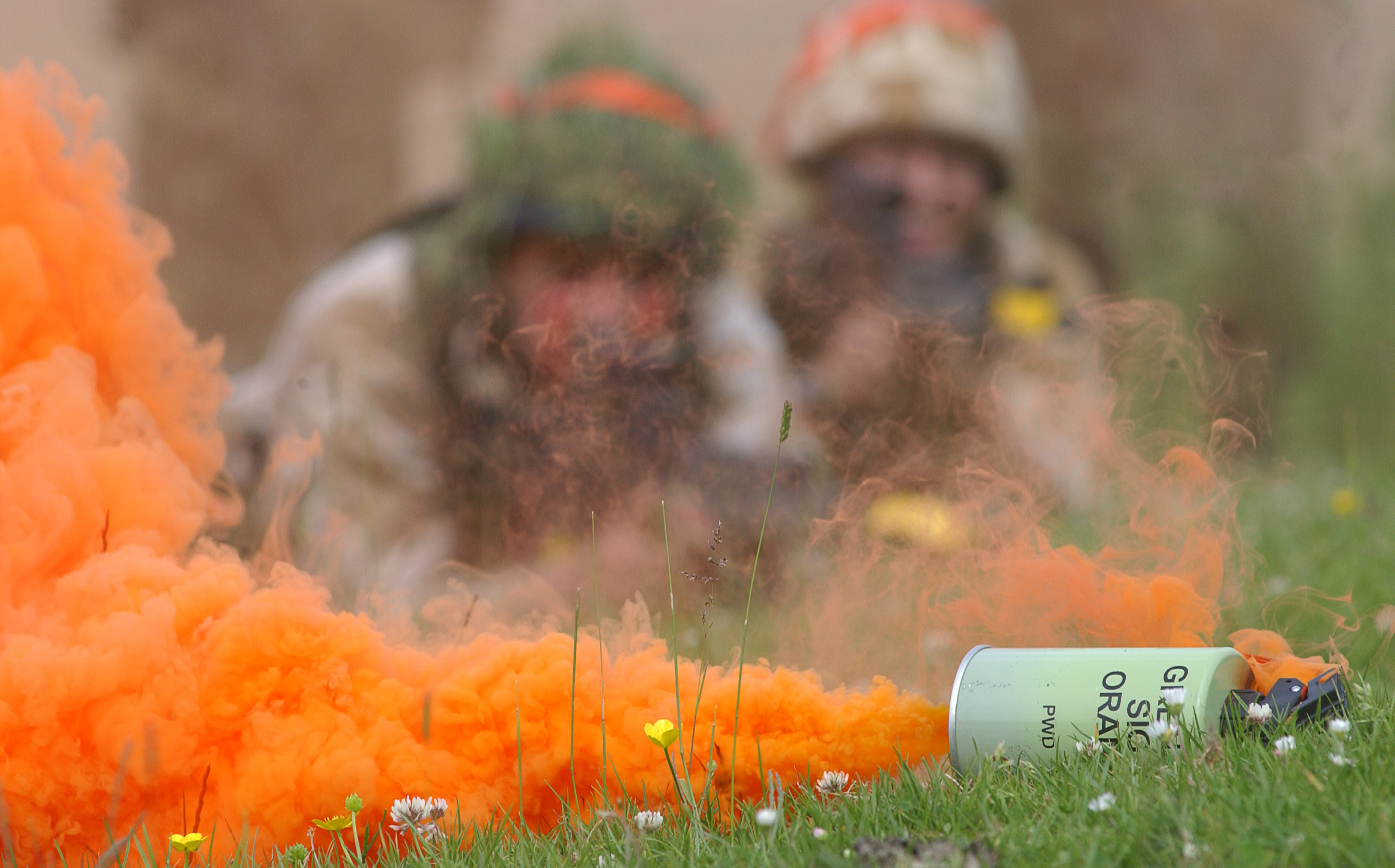 File:Soldiers deploy orange smoke canister MOD 45149504.jpg ...