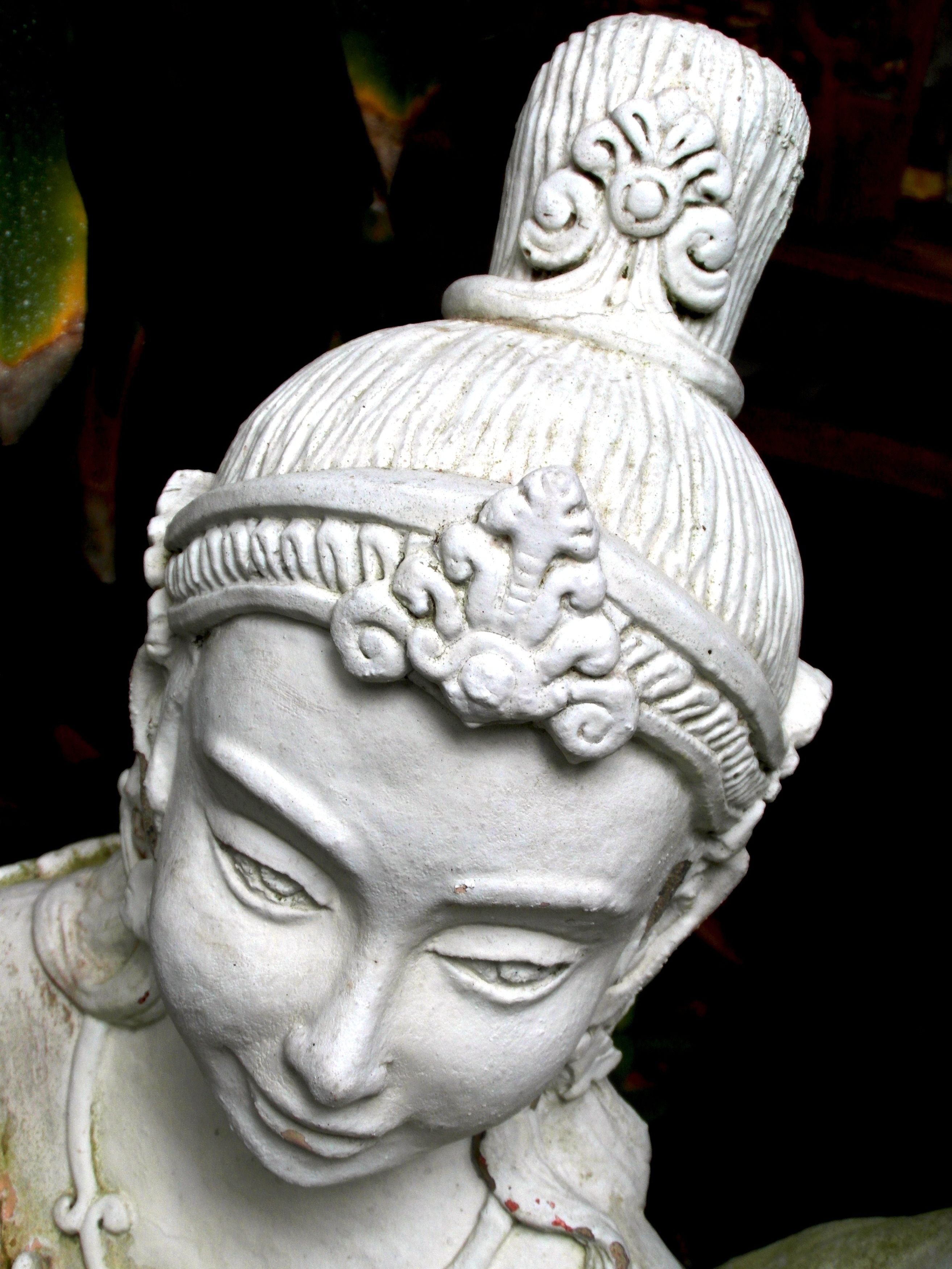 Oriental statue of a woman photo