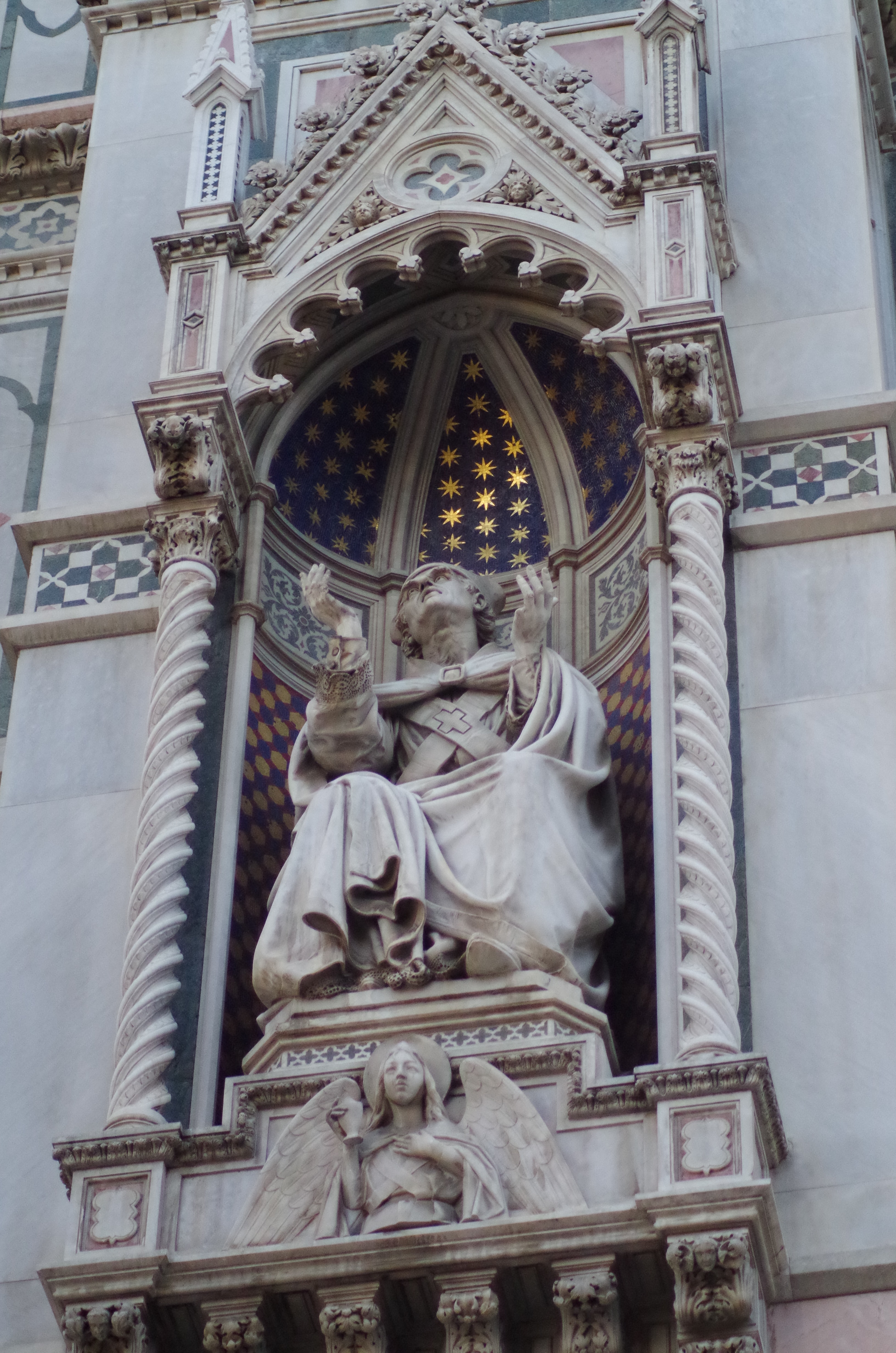 Ornate statue of person in robes photo