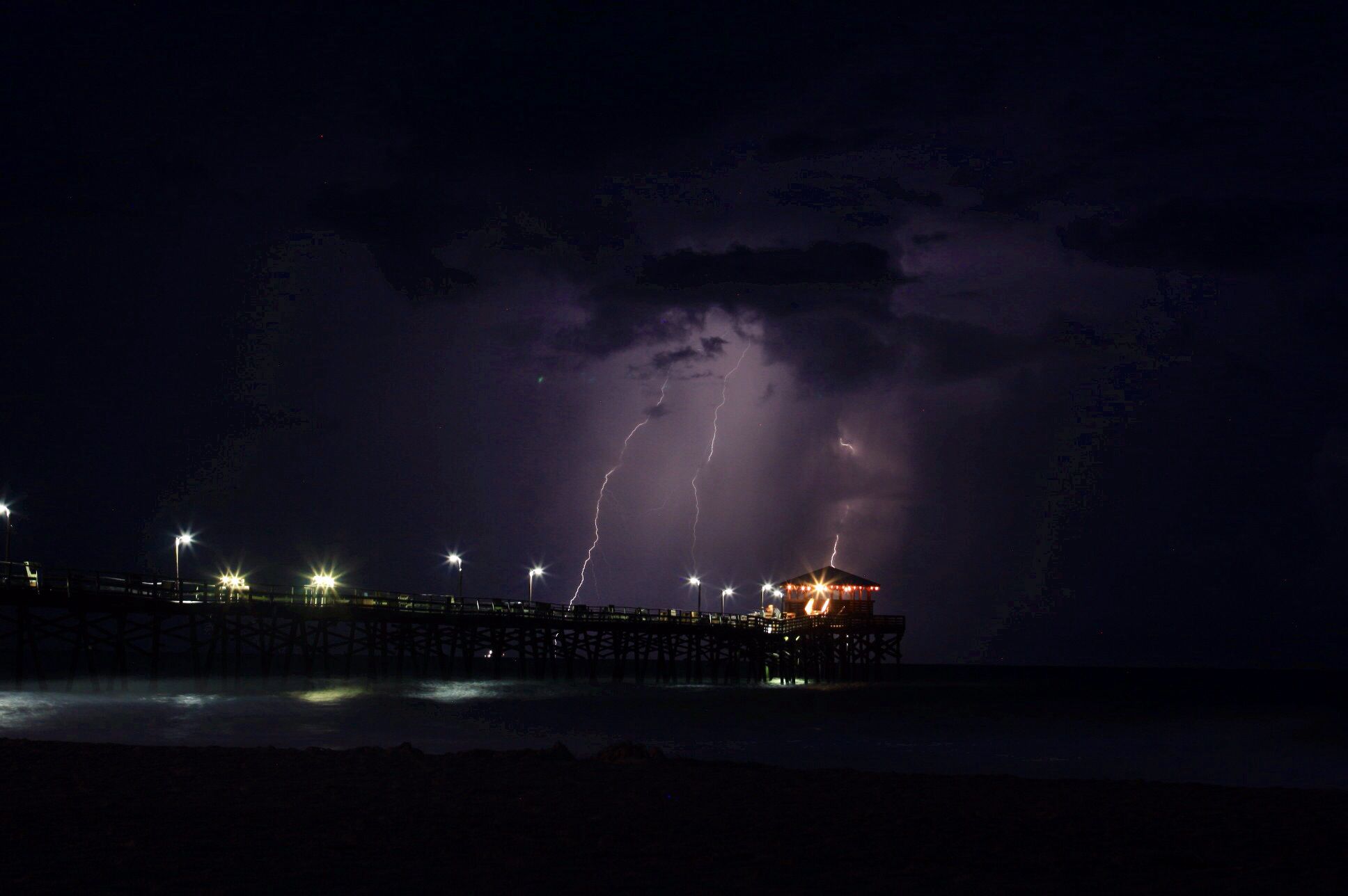 Lightning strikes over the Oceanana Pier in Atlantic Beach, NC ...
