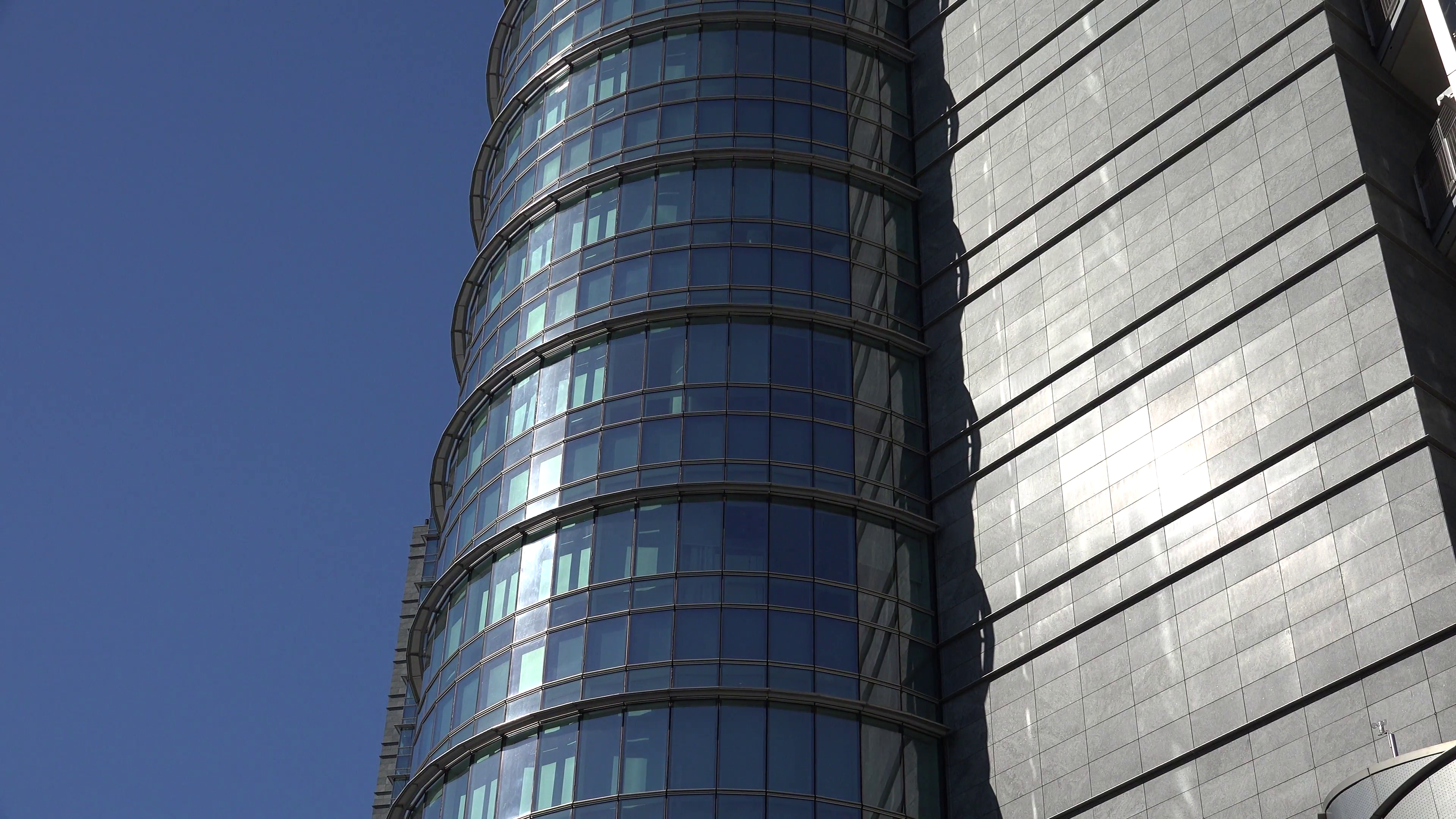 4K Closeup modern glass facade skyscraper design business tower ...