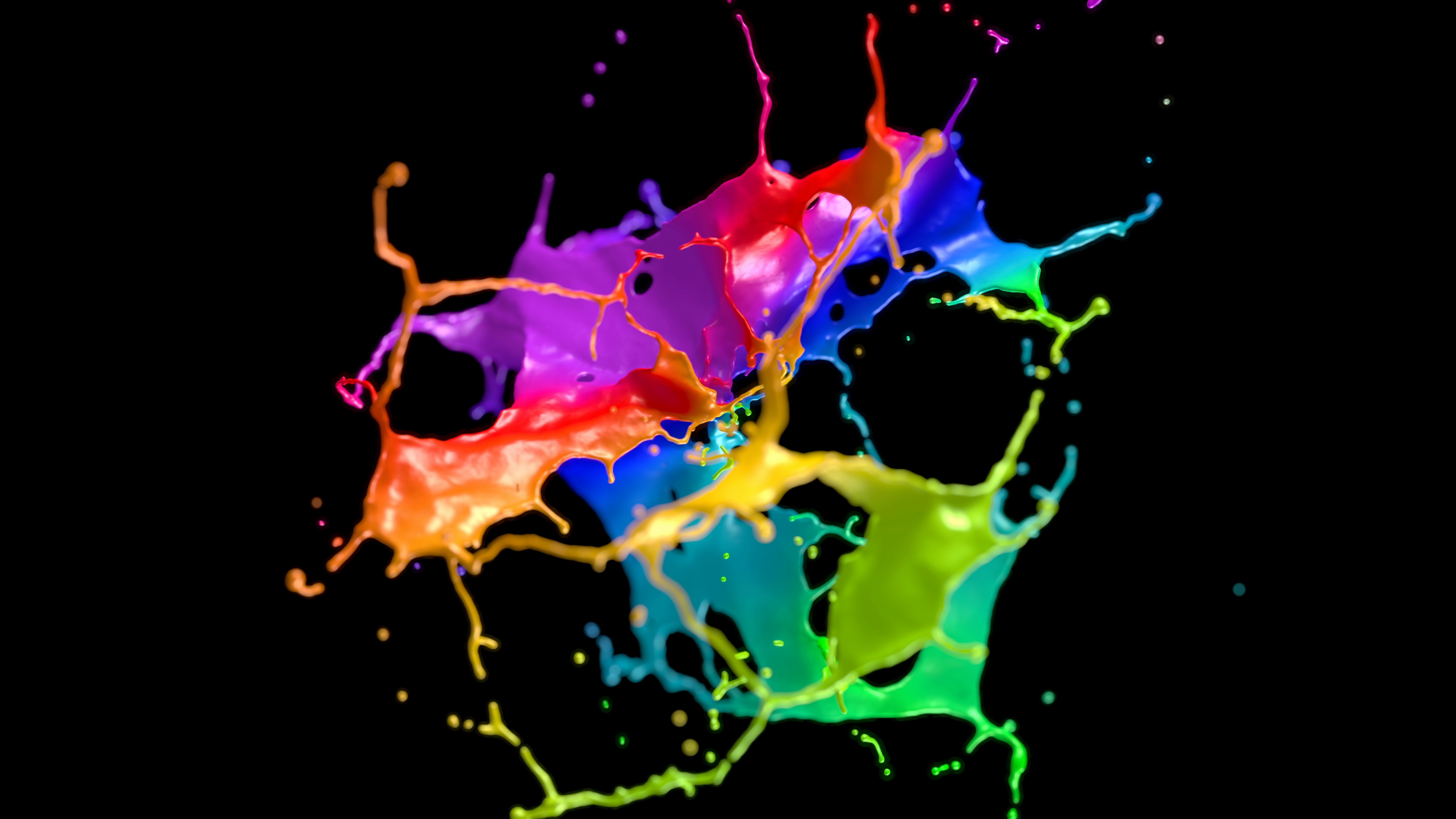 Cg animation of color paint explosion on black background. Slow ...