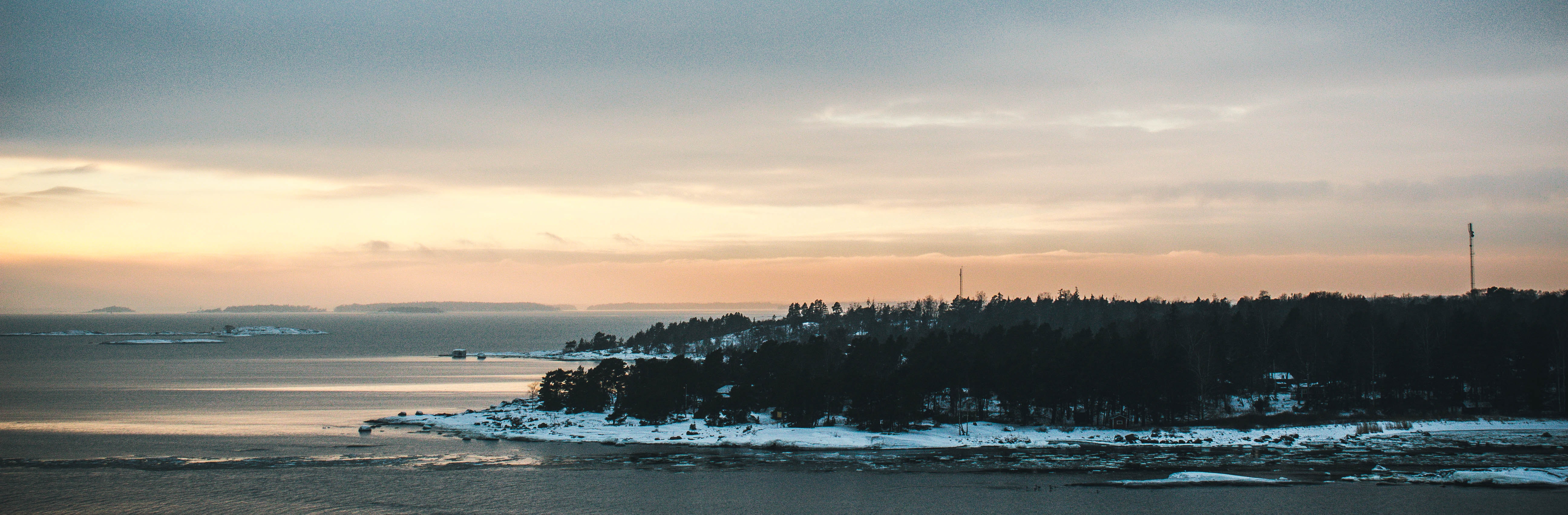 Panoramic photo of island during golden hour