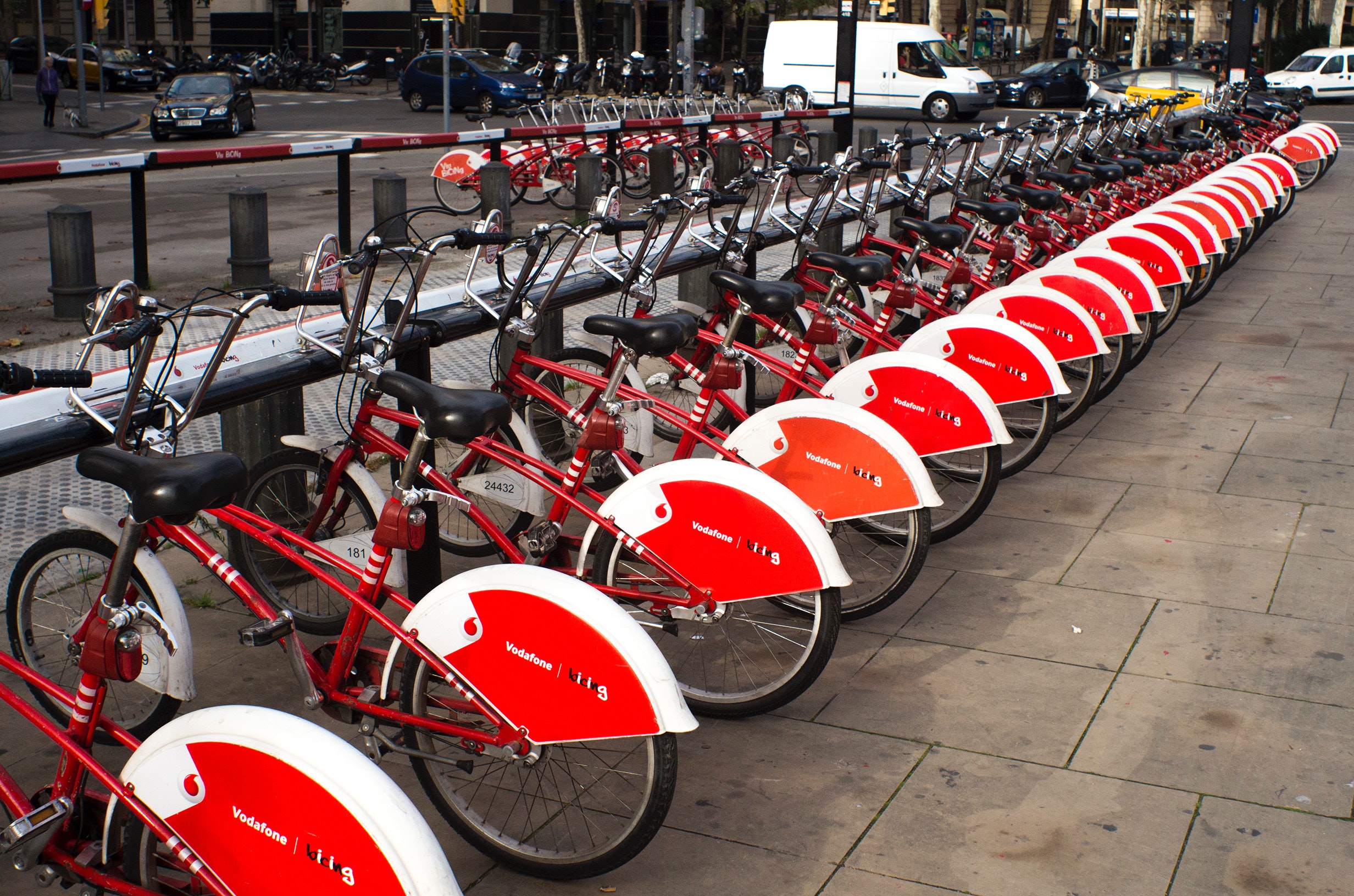 Parked red and white bicycles photo