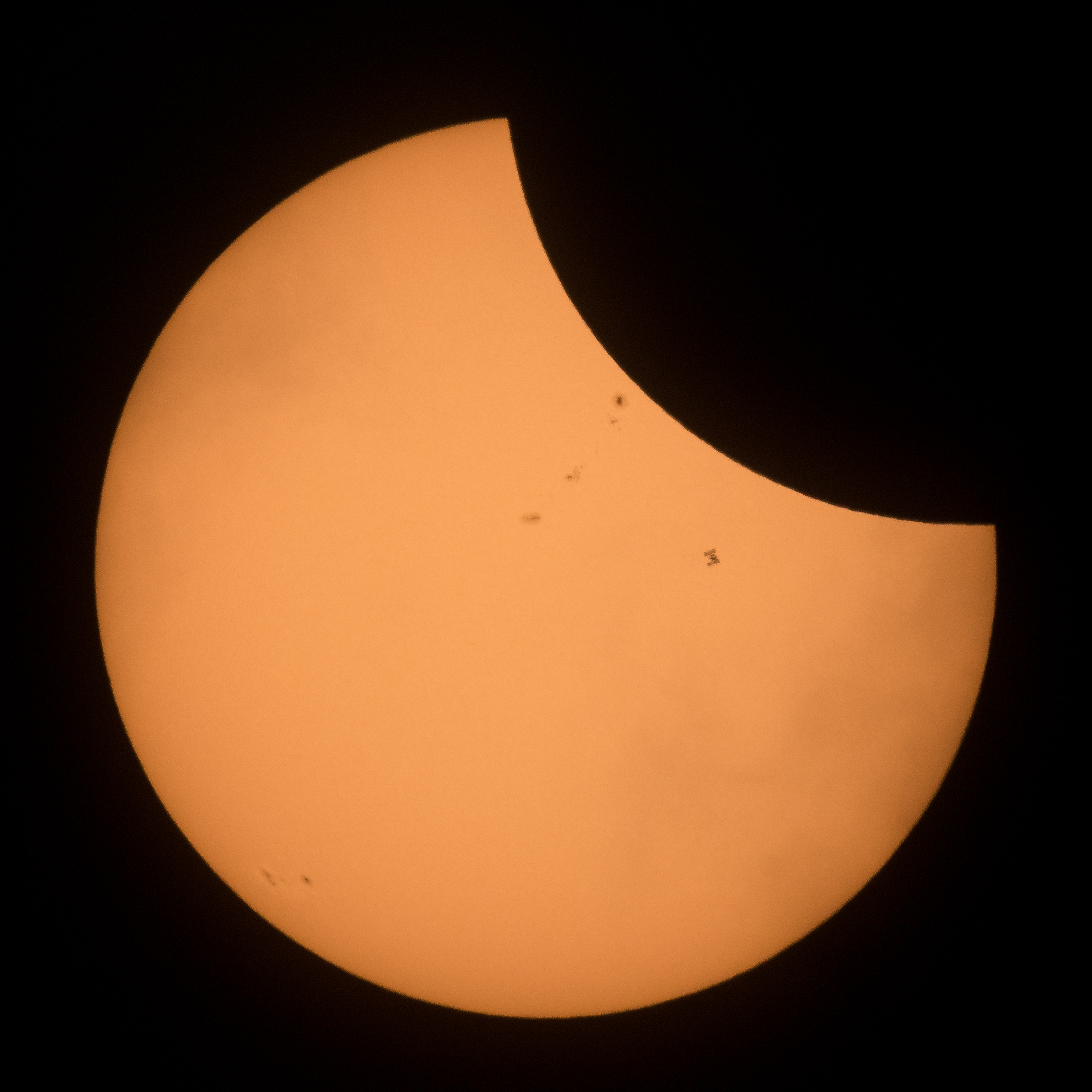 Silhouette of ISS During a Partial Solar Eclipse | NASA