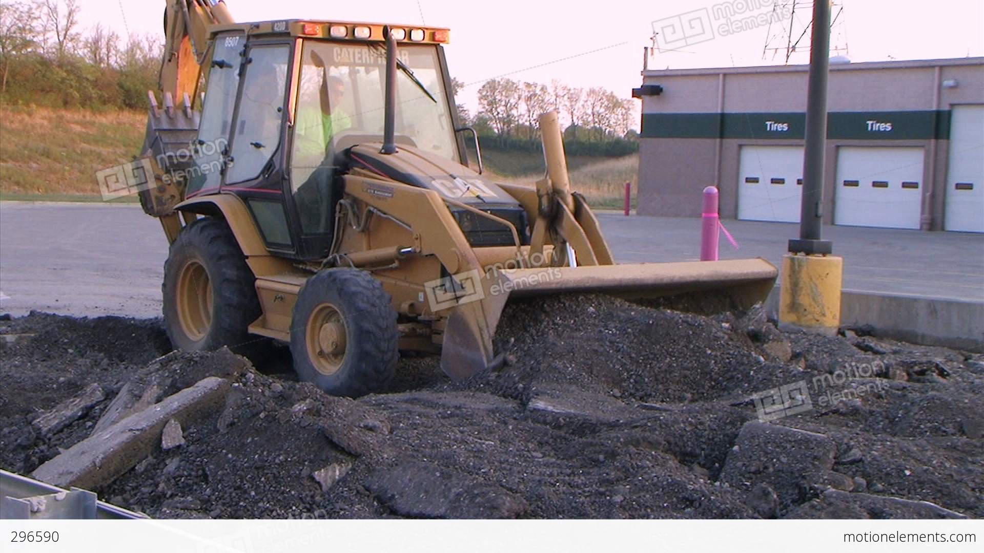 Backhoe Loader Pushing Pavement Stock video footage | 296590