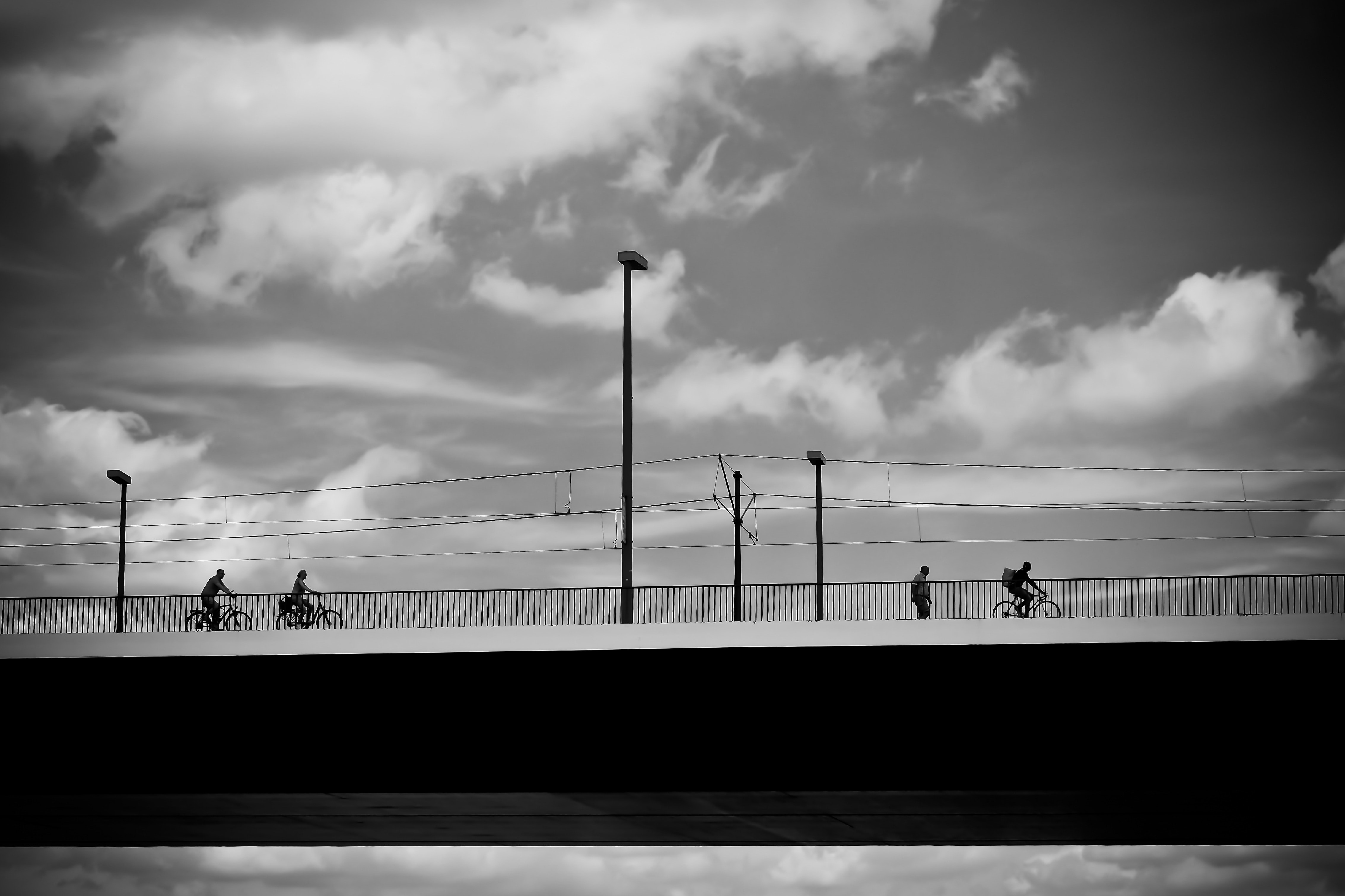 People riding on bicycle during daytime photo