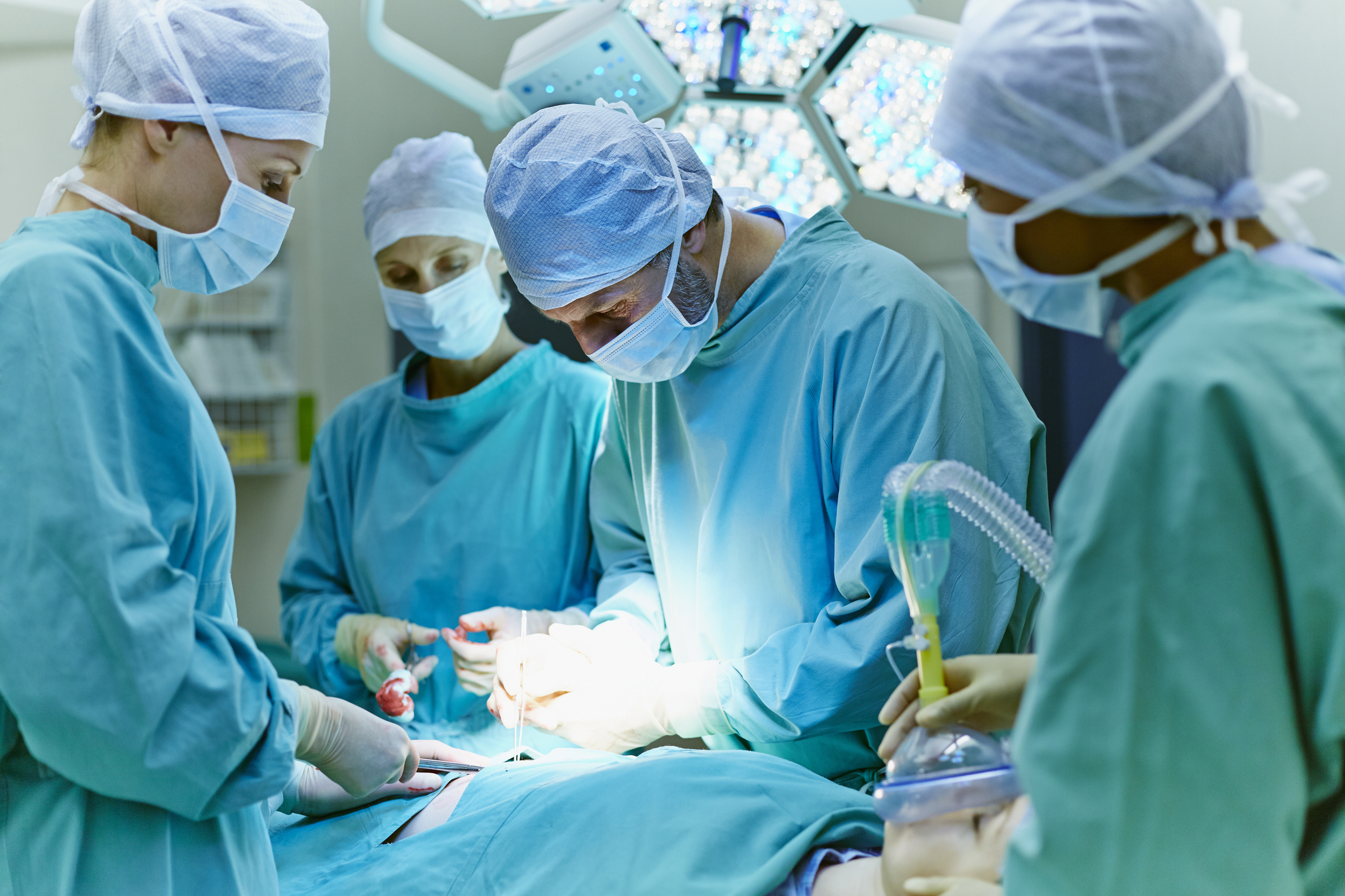 Surgeons performing surgery in operating room - Greenville Health System
