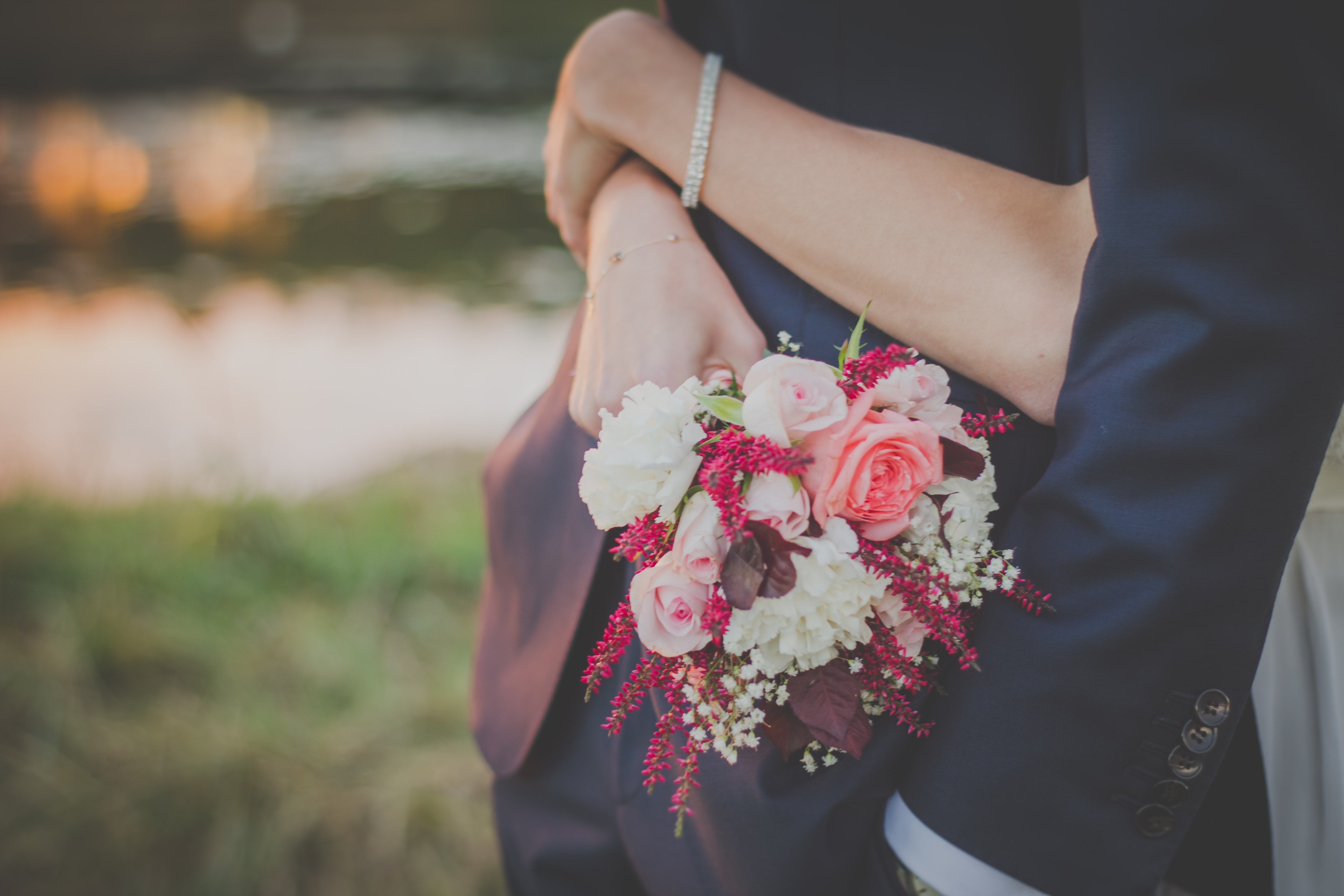 Person holding a bouquet of flower photo
