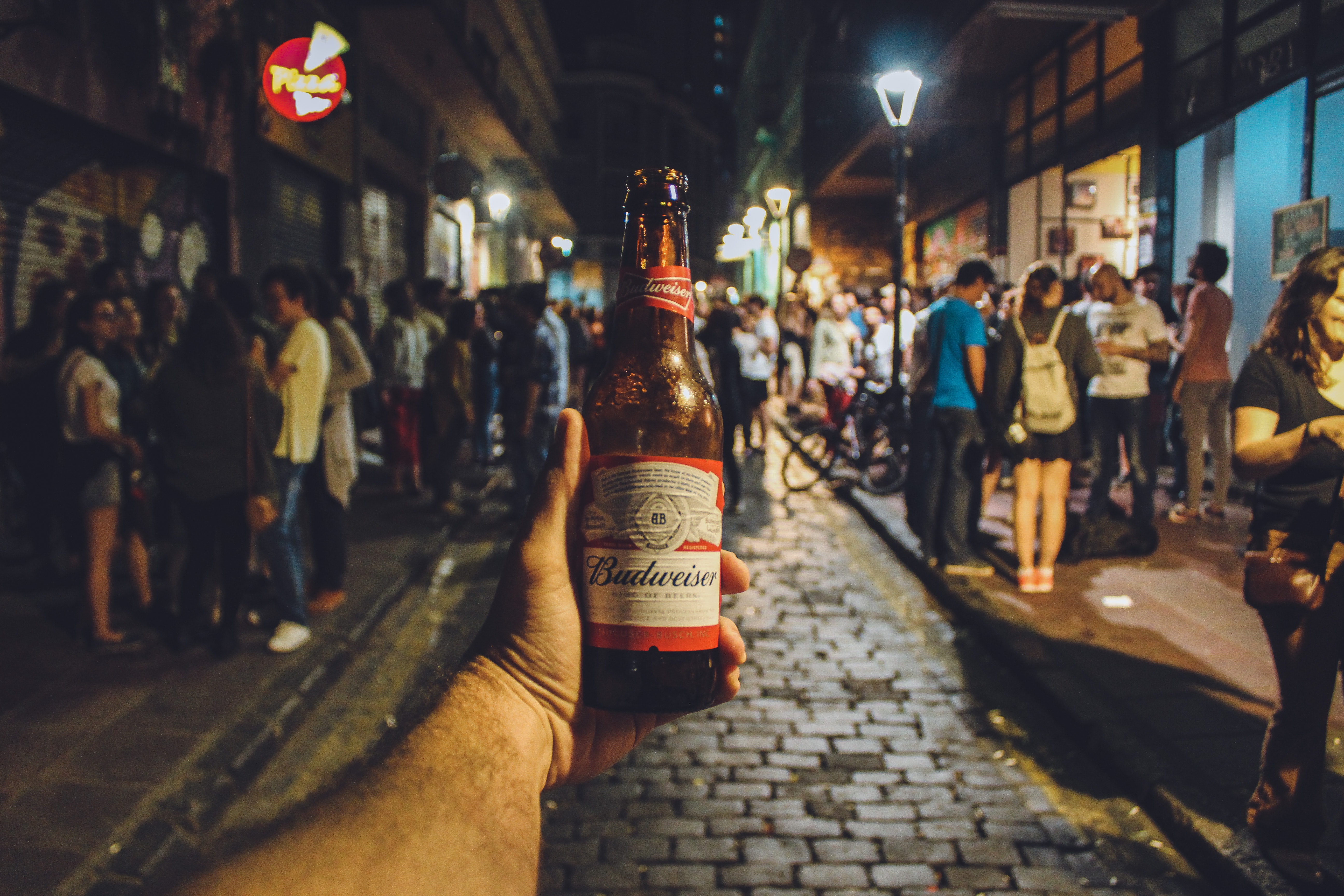 Person Holding Budweiser Bottle, Night, Walking, Urban, Travel, HQ Photo
