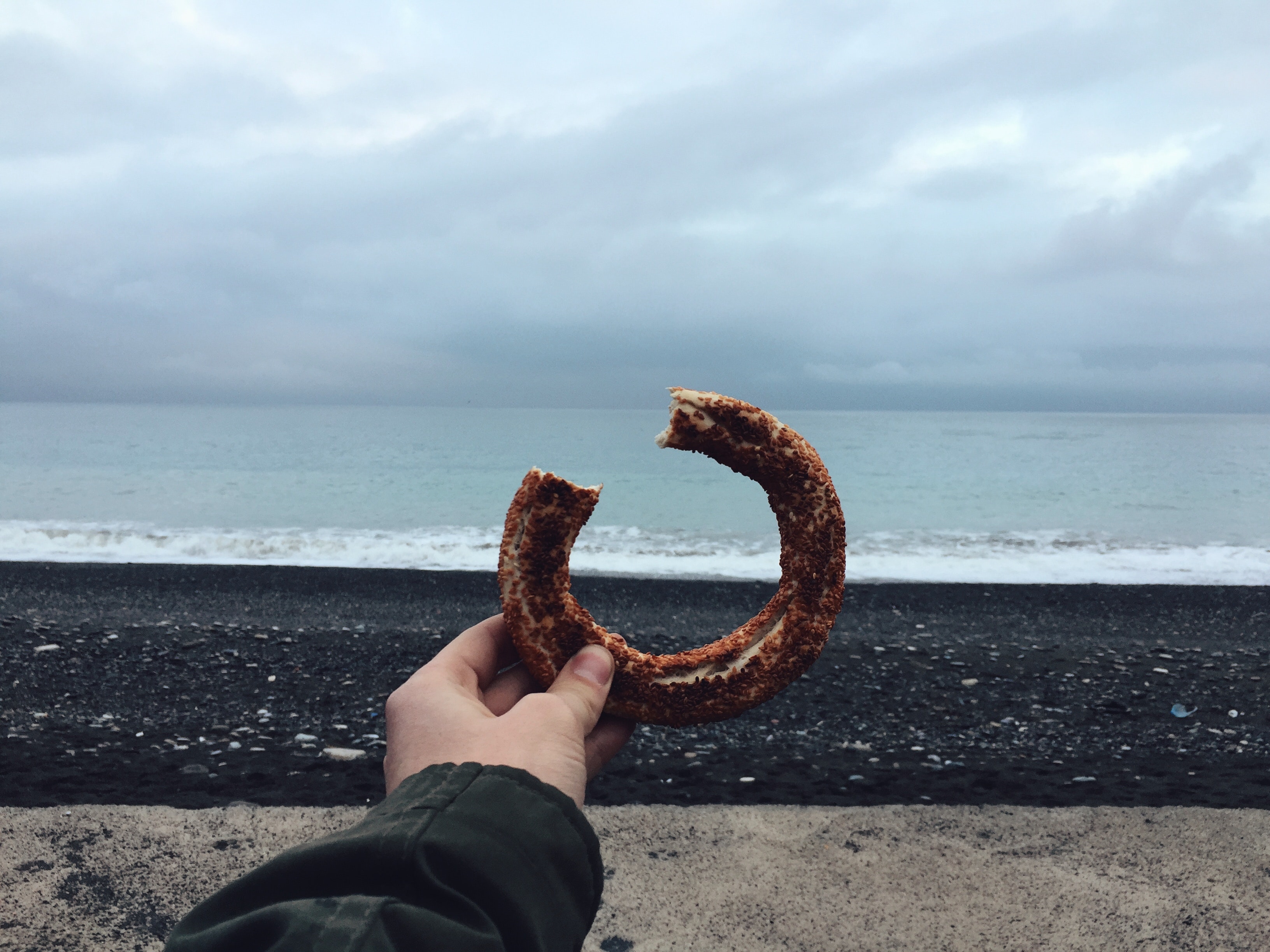 Person holding donut photo