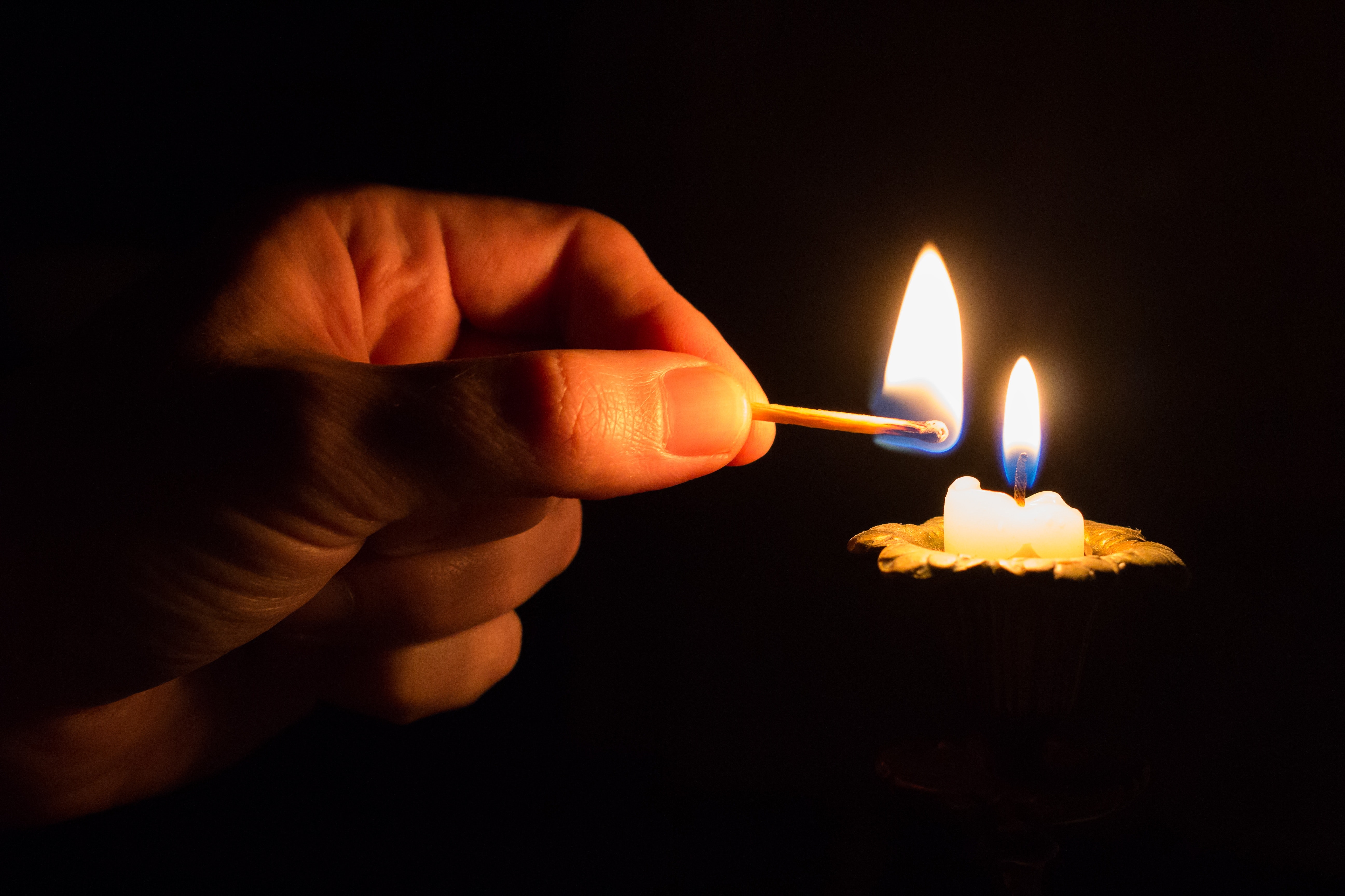 Person Holding Match Stick With Fire in Front of Candle With Fire, Blur, Hand, Wax, Match, HQ Photo