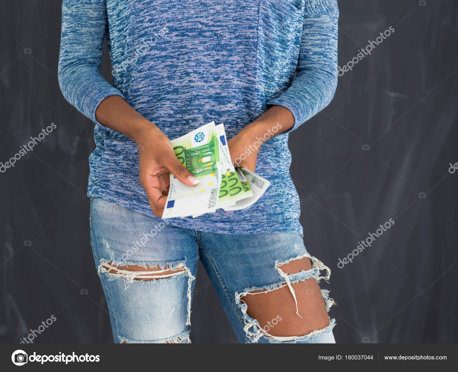 black woman holding money on gray background — Stock Photo © .shock ...