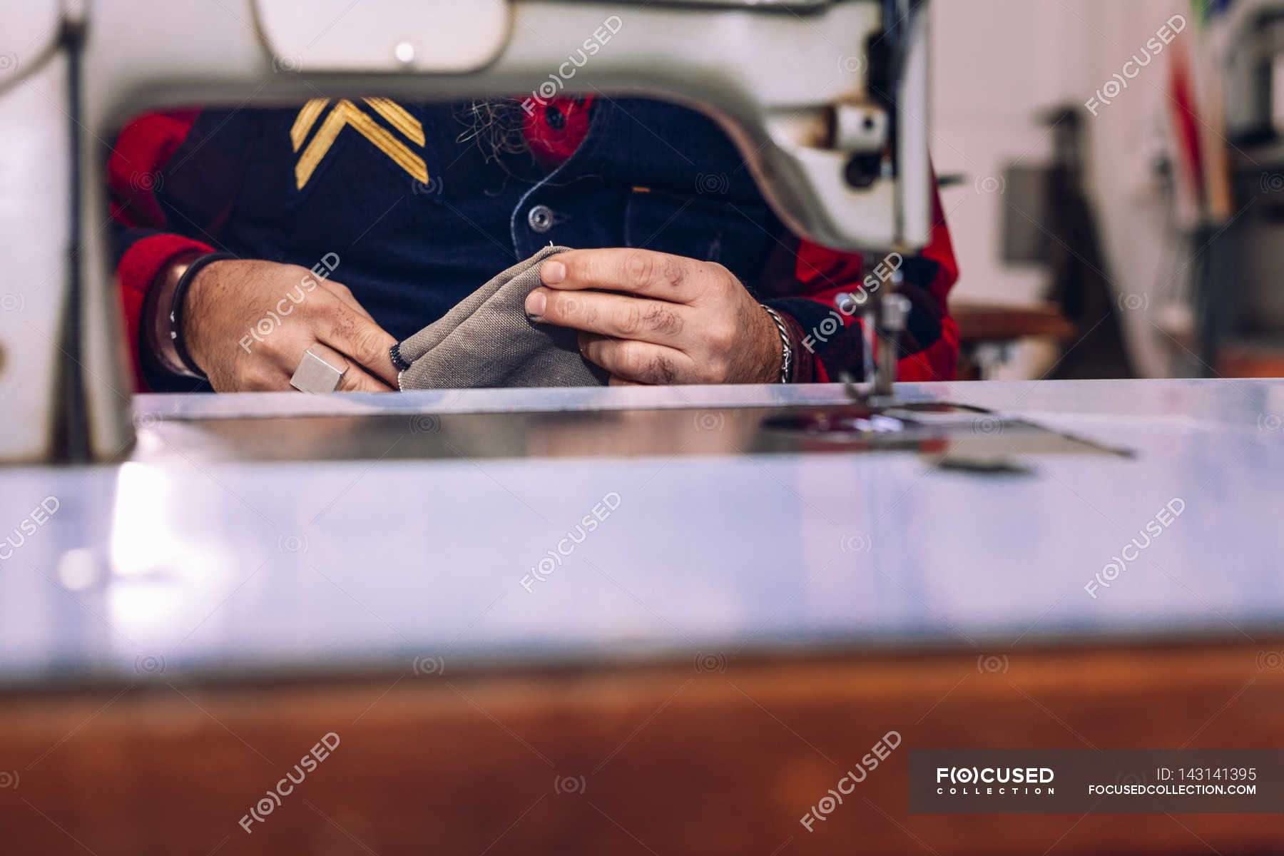 Male worker holding bag pocket — Stock Photo | #143141395