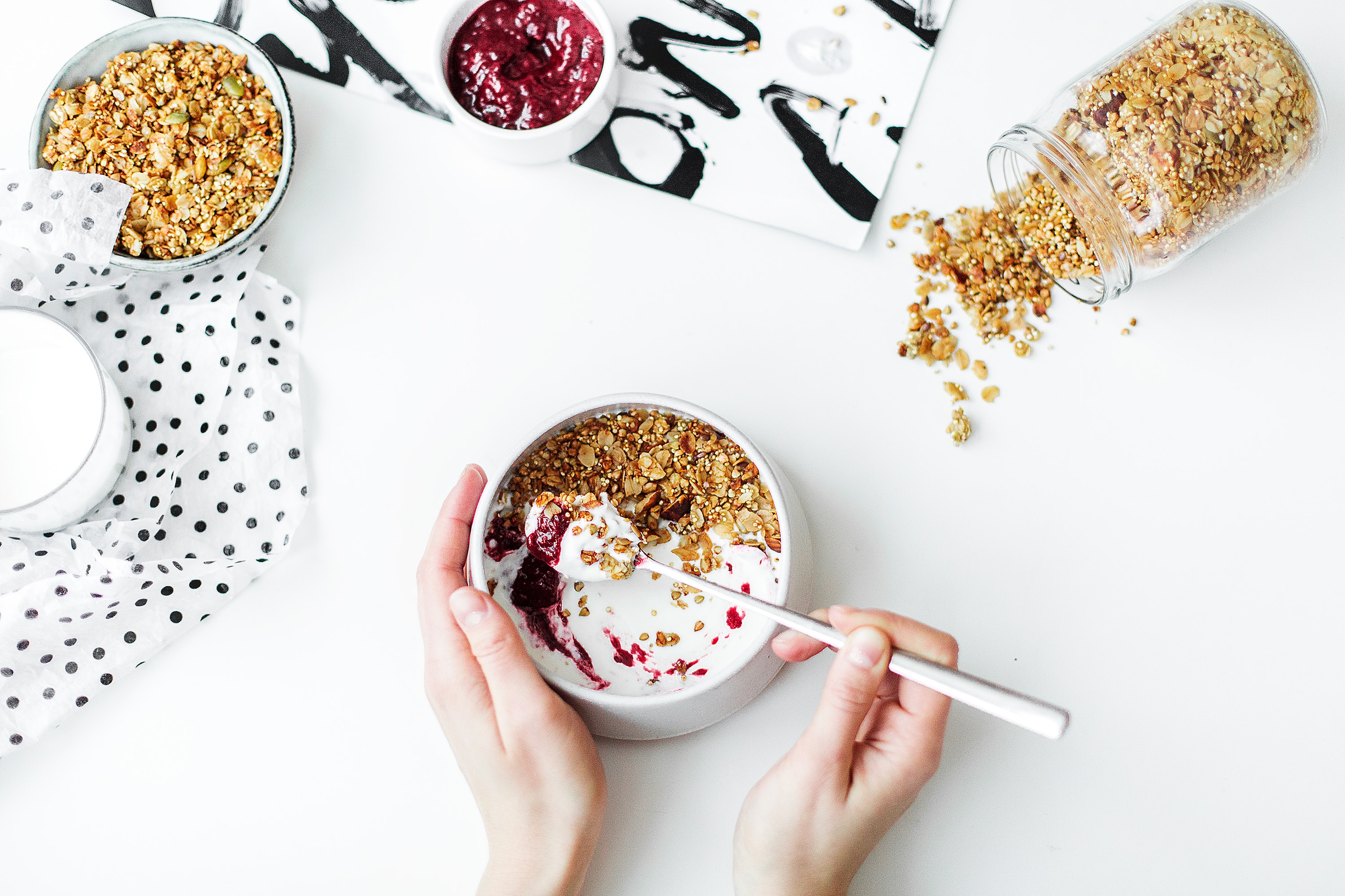 Person Mixing Cereal, Milk, and Strawberry Jam on White Ceramic Bowl, From above, Table, Sweet, Spoon, HQ Photo