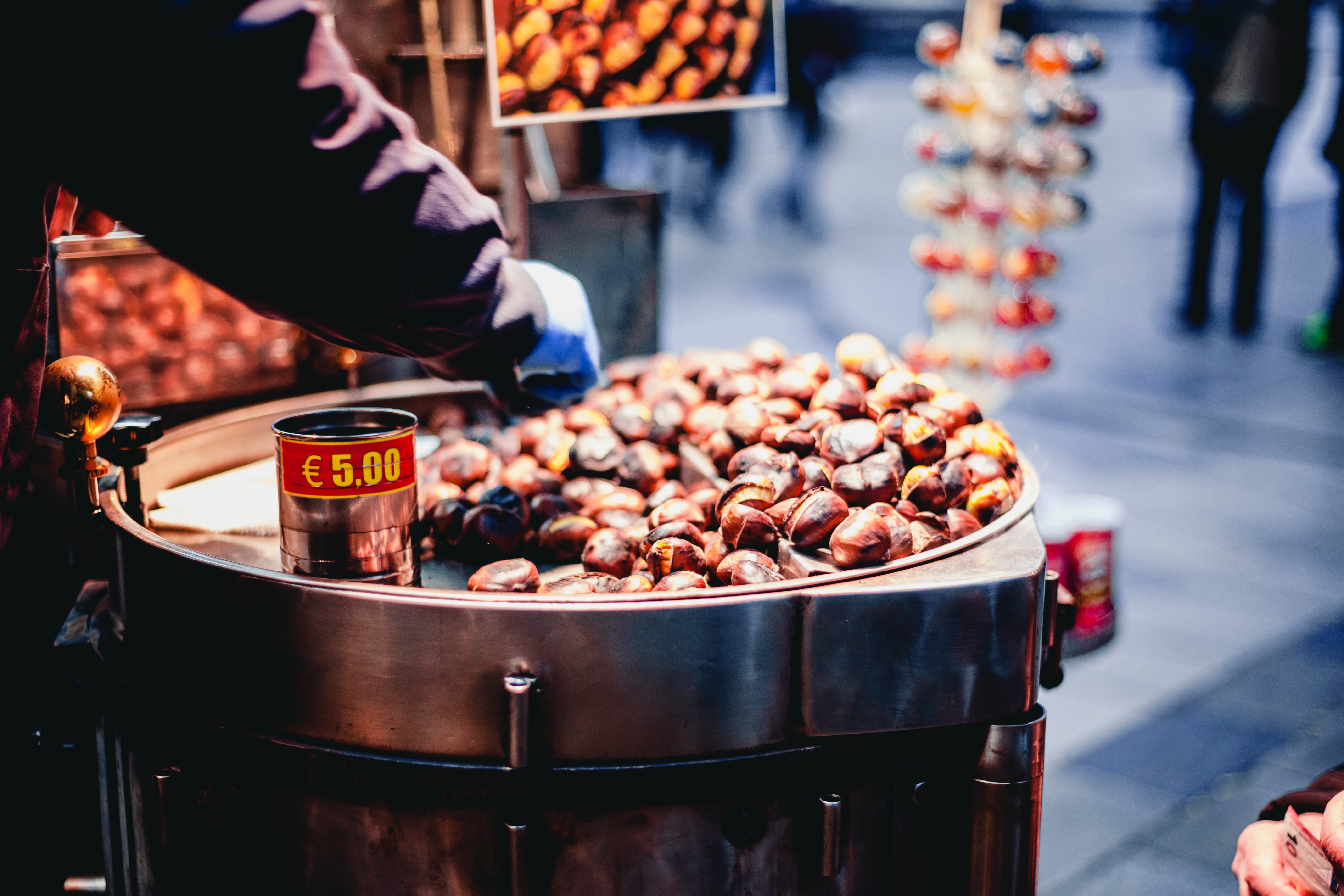 Person selling chestnuts photo