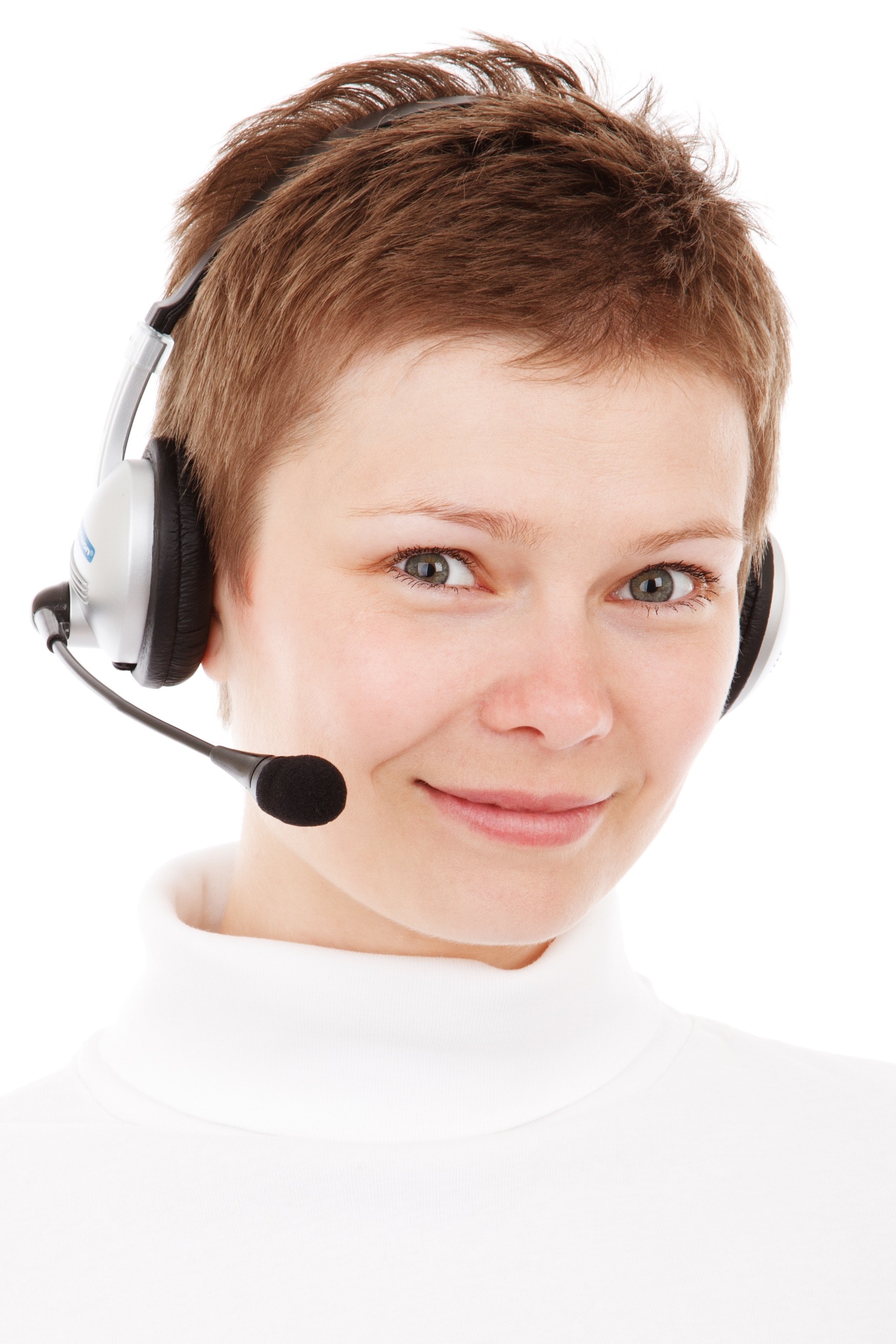 Person wearing silver headset smiling photo