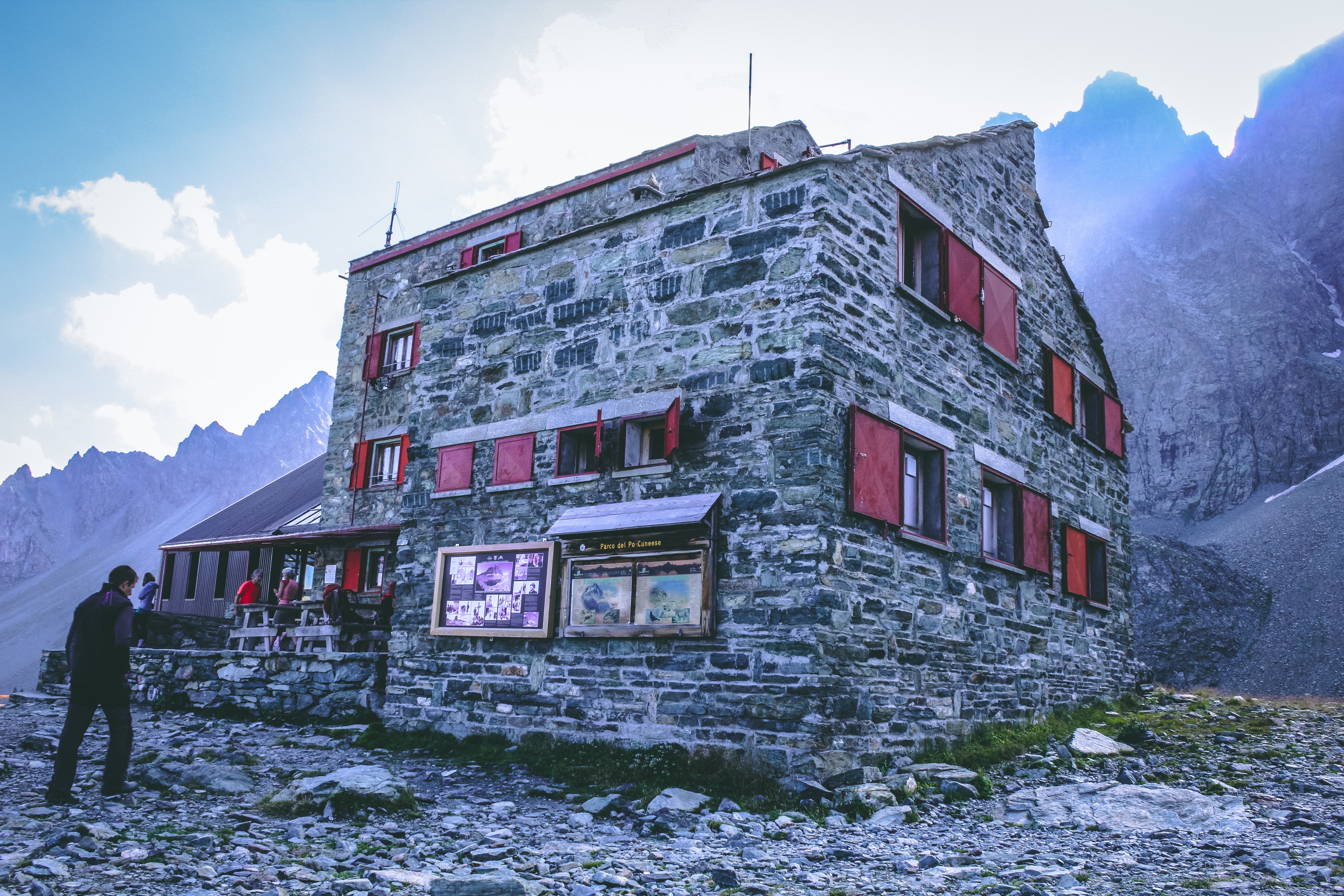 Photography of Concrete Building Near Mountains