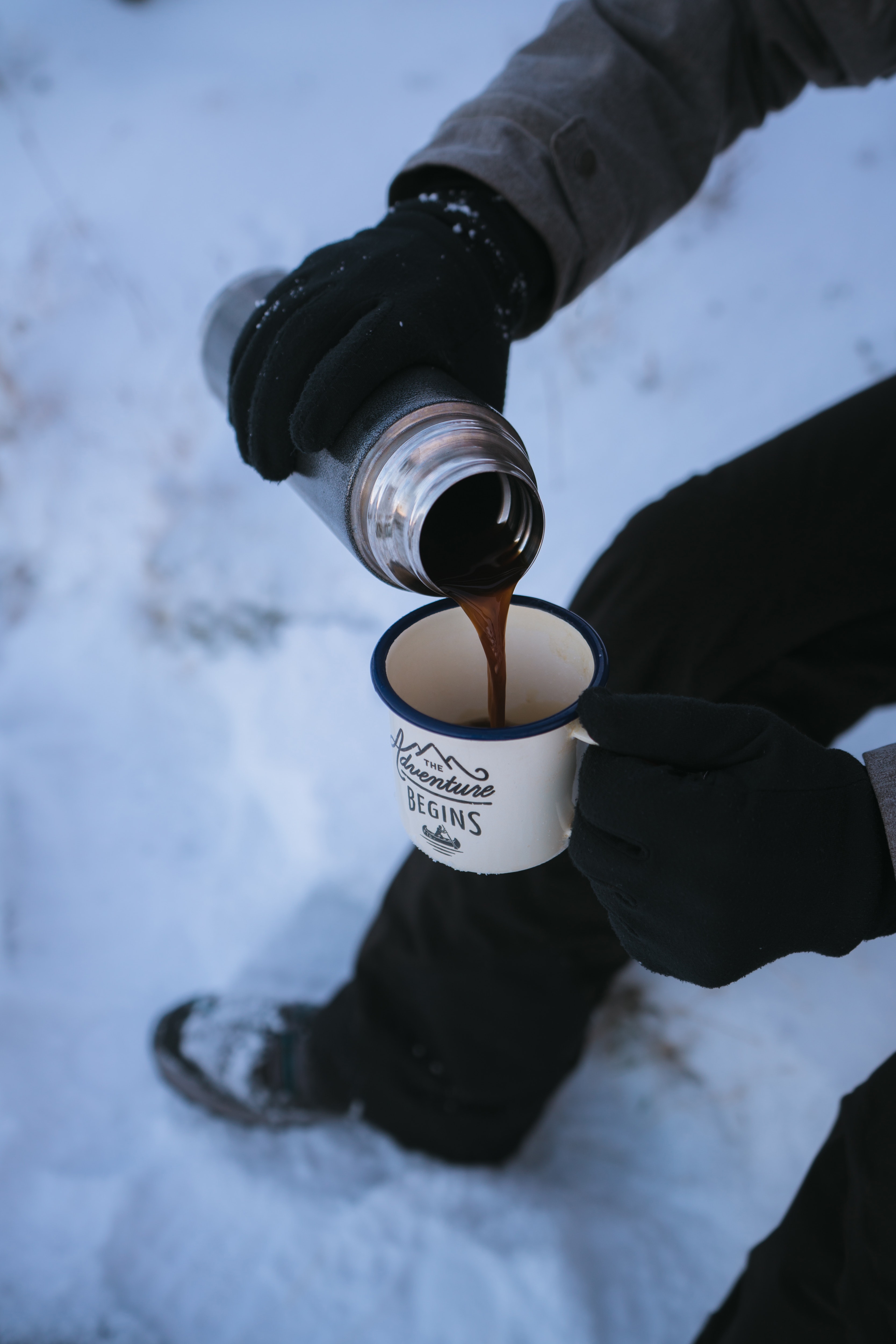 Photo of a Person Pouring Coffee in the Mug, Adventure, Hike, Winter, Weather, HQ Photo
