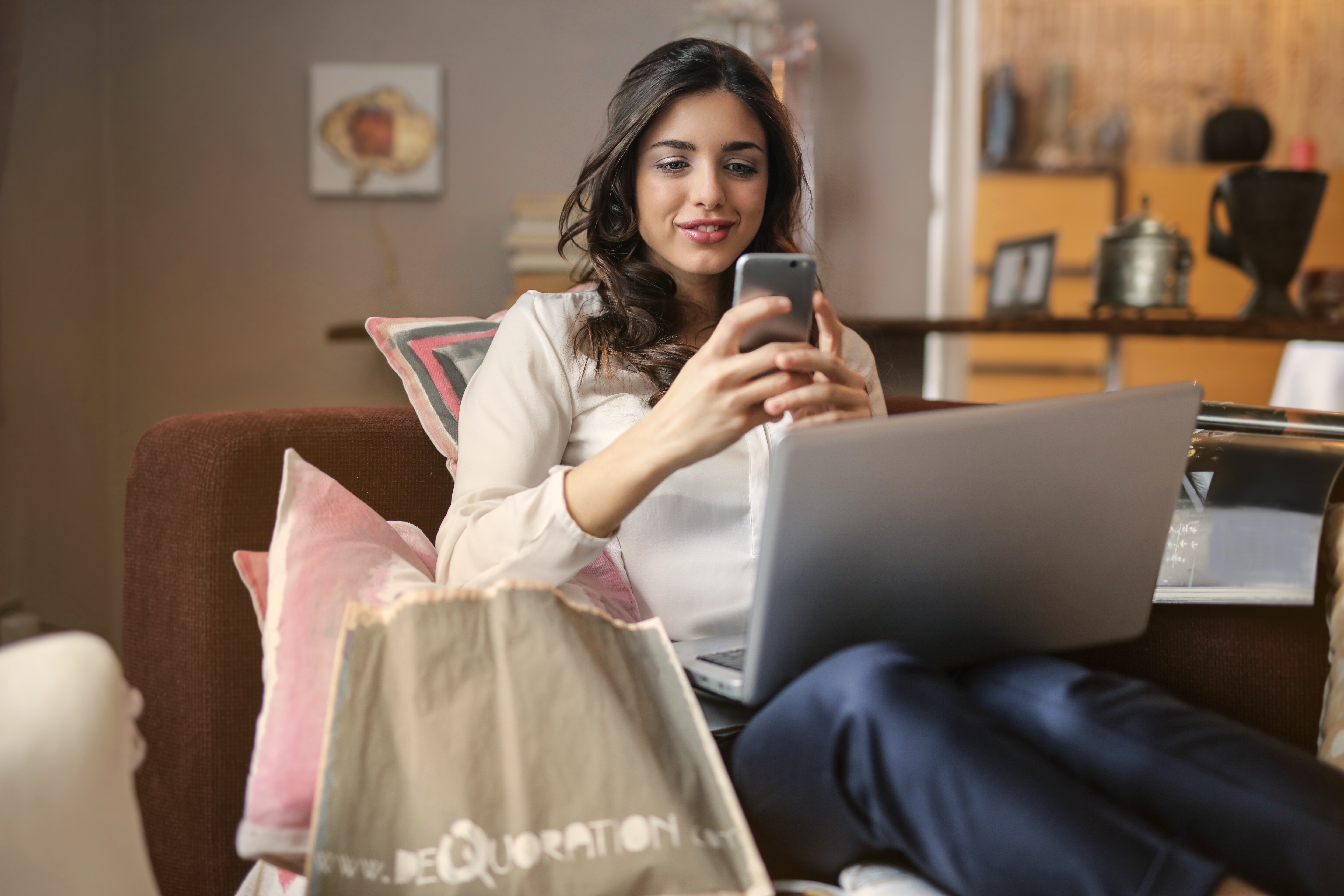 Photo of a woman using her smartphone