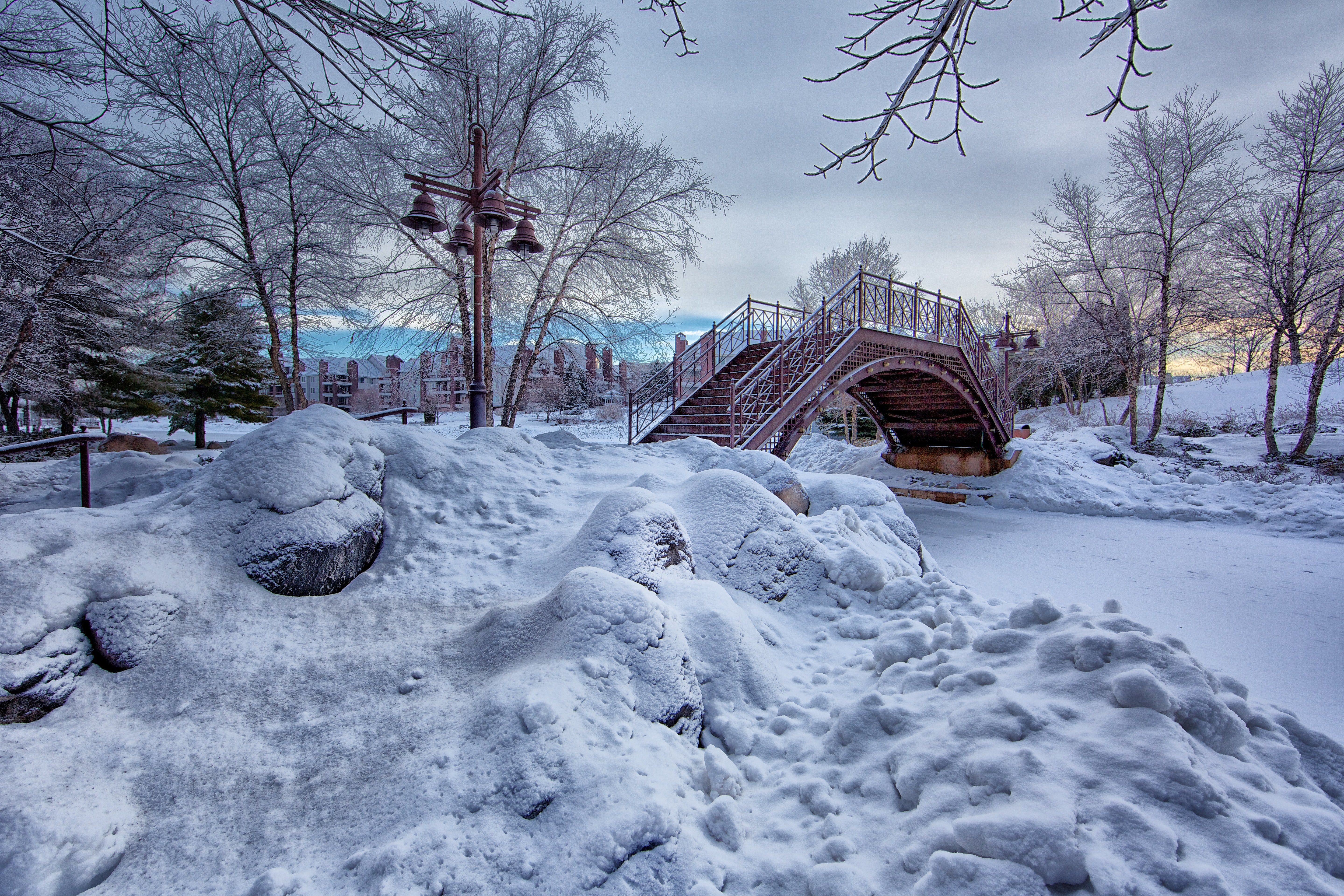 Photo of bridge with white snow