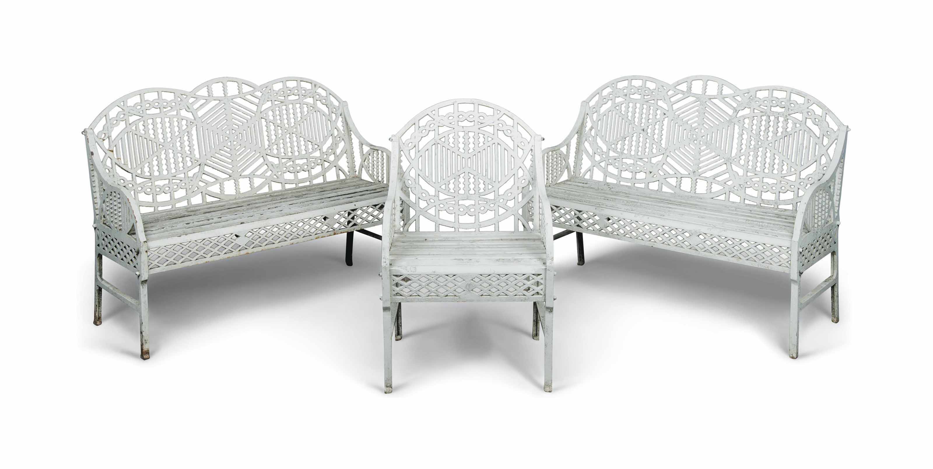 A PAIR OF CAST-IRON GARDEN SEATS AND A MATCHING CHAIR | DESIGNED BY ...